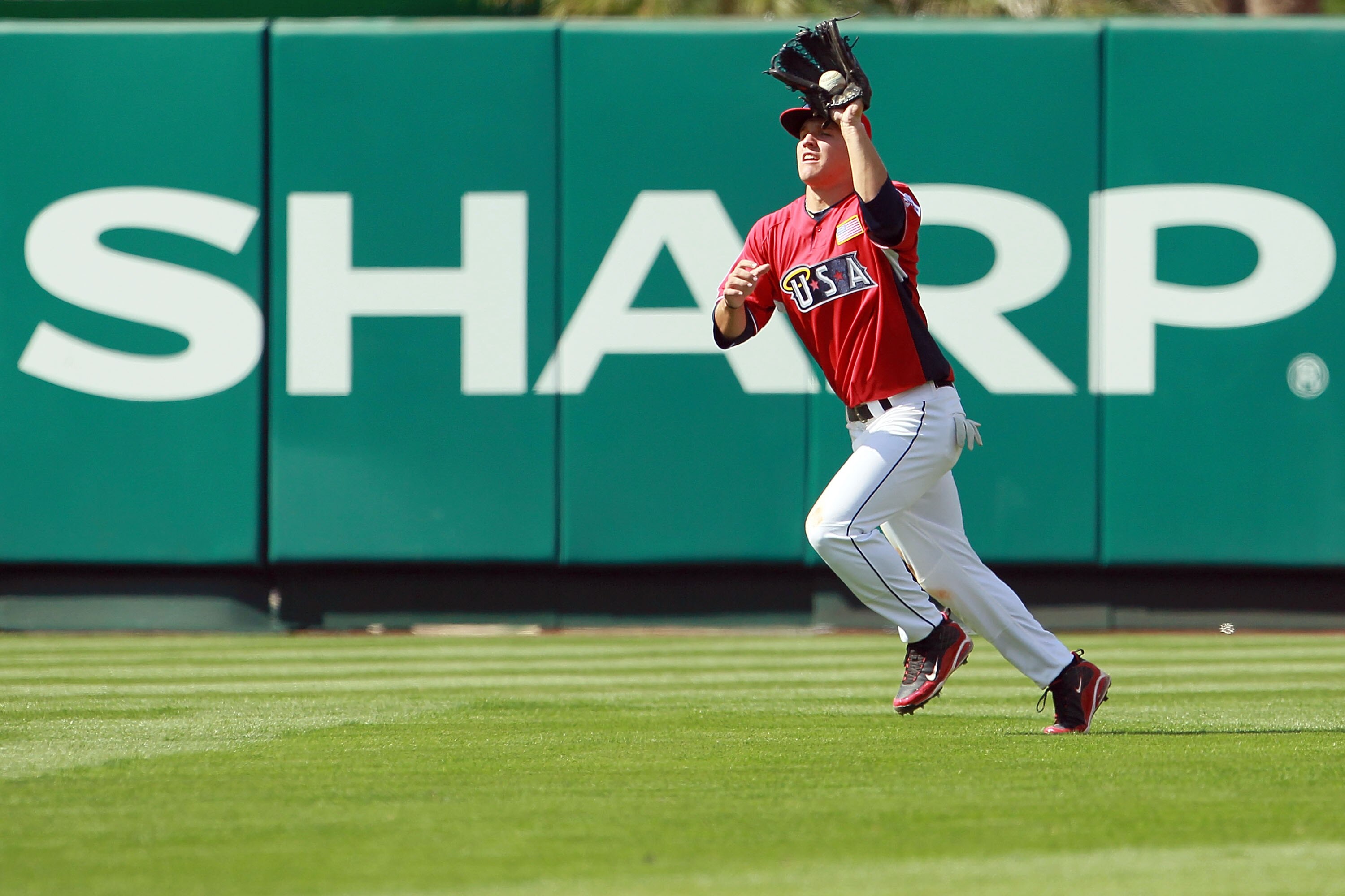 ANAHEIM, CA - JULY 11:  U.S. Futures All-Star Brett Jackson #13 of the Chicago Cubs fields a pop fly during the 2010 XM All-Star Futures Game at Angel Stadium of Anaheim on July 11, 2010 in Anaheim, California.  (Photo by Jeff Gross/Getty Images)