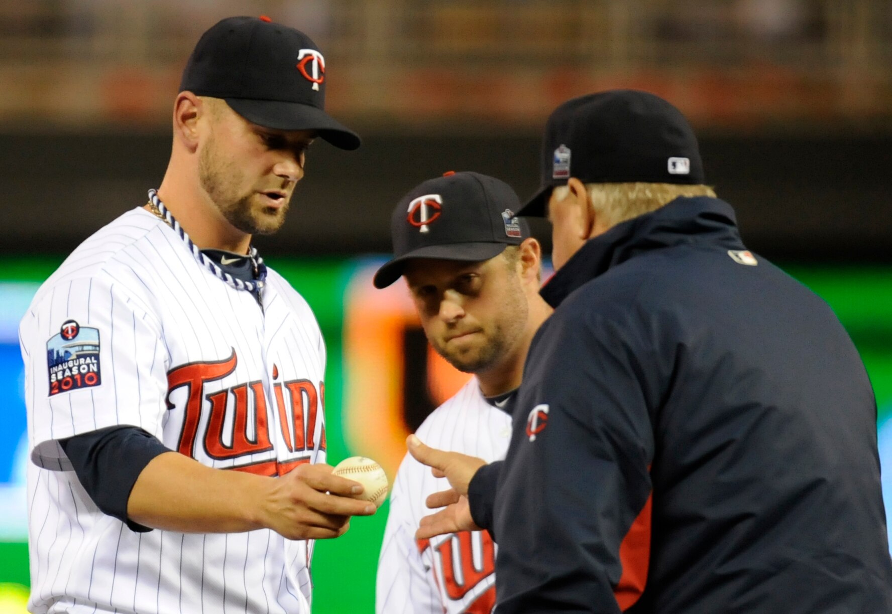 MINNEAPOLIS, MN - OCTOBER 6: Jesse Crain #28 of the Minnesota Twins is pulled from game one of the ALDS against the New York Yankees by manager Ron Gardenhire #35 on October 6, 2010 at Target Field in Minneapolis, Minnesota. (Photo by Hannah Foslien /Gett