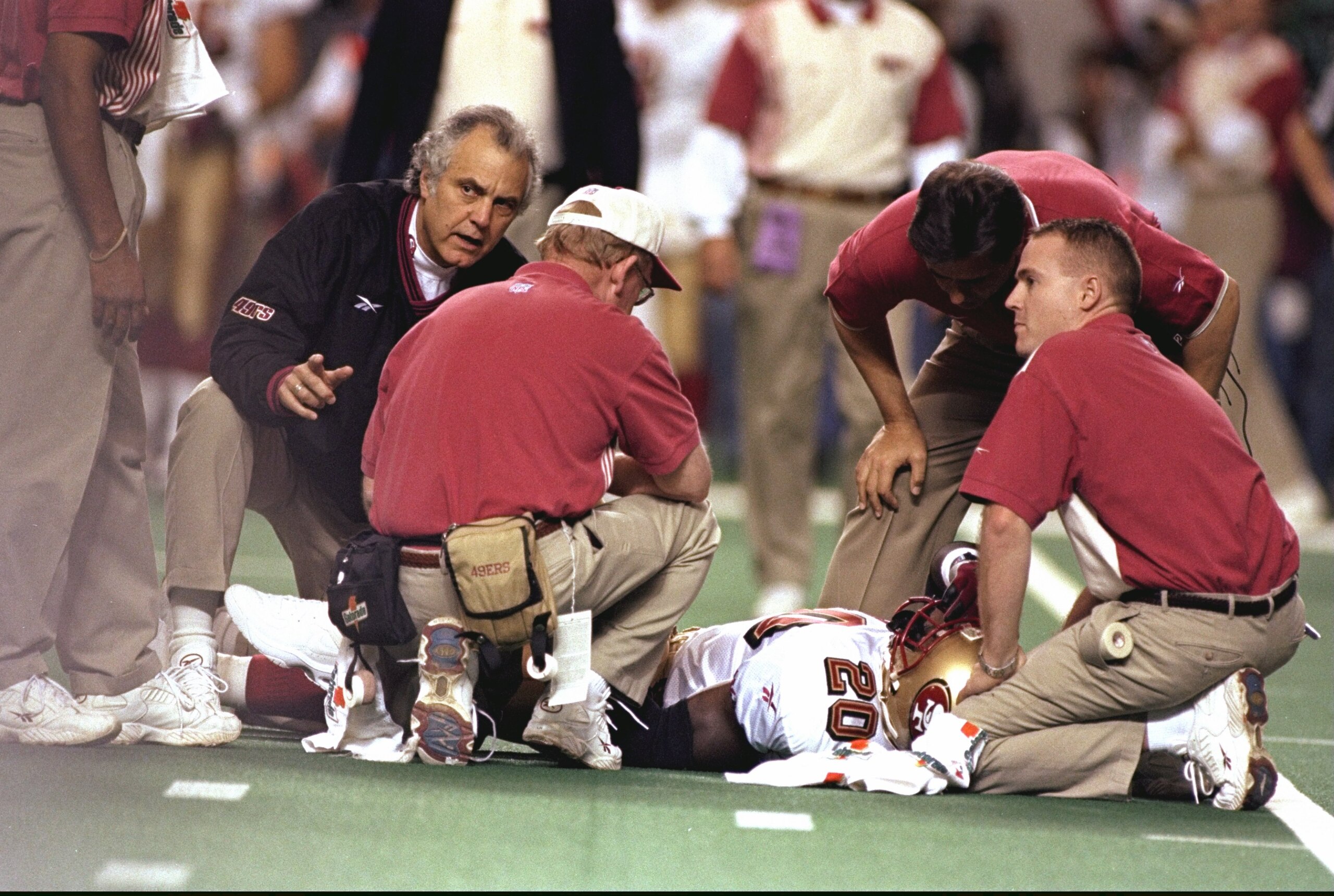 9 Jan 1999: Garrison Hearst #20 of the San Francisco 49ers lays on the field with a broken leg during the NFC Play Offs against the Atlanta Falcons at the Georgia Dome in Atlanta, Georgia. The Falcons defeated the 49ers 20-16. Mandatory Credit: Craig Jon 9 Jan 1999: Garrison Hearst #20 of the San Francisco 49ers lays on the field with a broken leg during the NFC Play Offs against the Atlanta Falcons at the Georgia Dome in Atlanta, Georgia. The Falcons defeated the 49ers 20-16. Mandatory Credit: Craig Jon