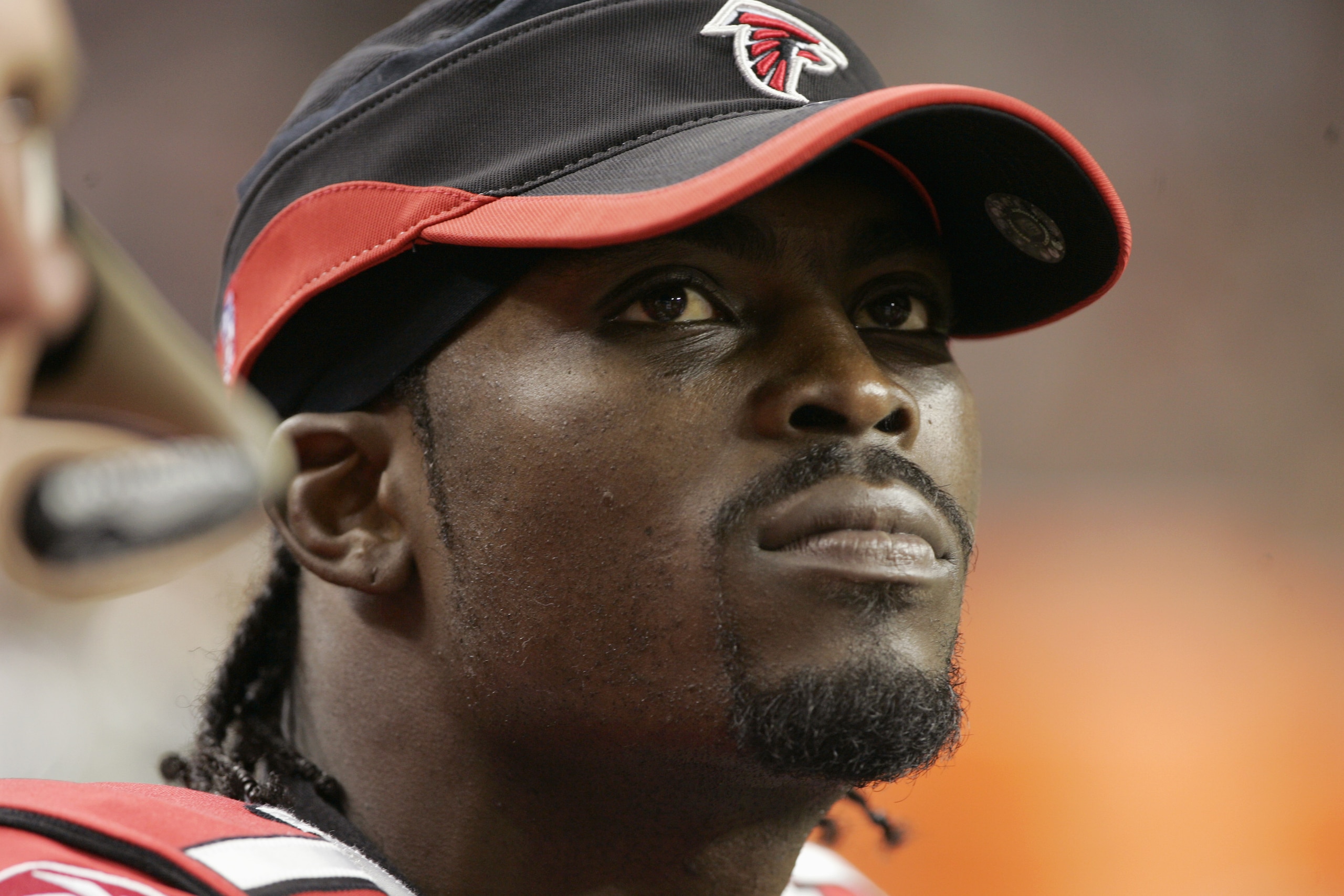 ATLANTA - OCTOBER 2: Quarterback Michael Vick #7 of the Atlanta Falcons sits on the bench in the third quarter after injuring his knee against the Minnesota Vikings in the second quarter on October 2, 2005 at the Georgia Dome in Atlanta, Georgia. (Photo ATLANTA - OCTOBER 2: Quarterback Michael Vick #7 of the Atlanta Falcons sits on the bench in the third quarter after injuring his knee against the Minnesota Vikings in the second quarter on October 2, 2005 at the Georgia Dome in Atlanta, Georgia. (Photo