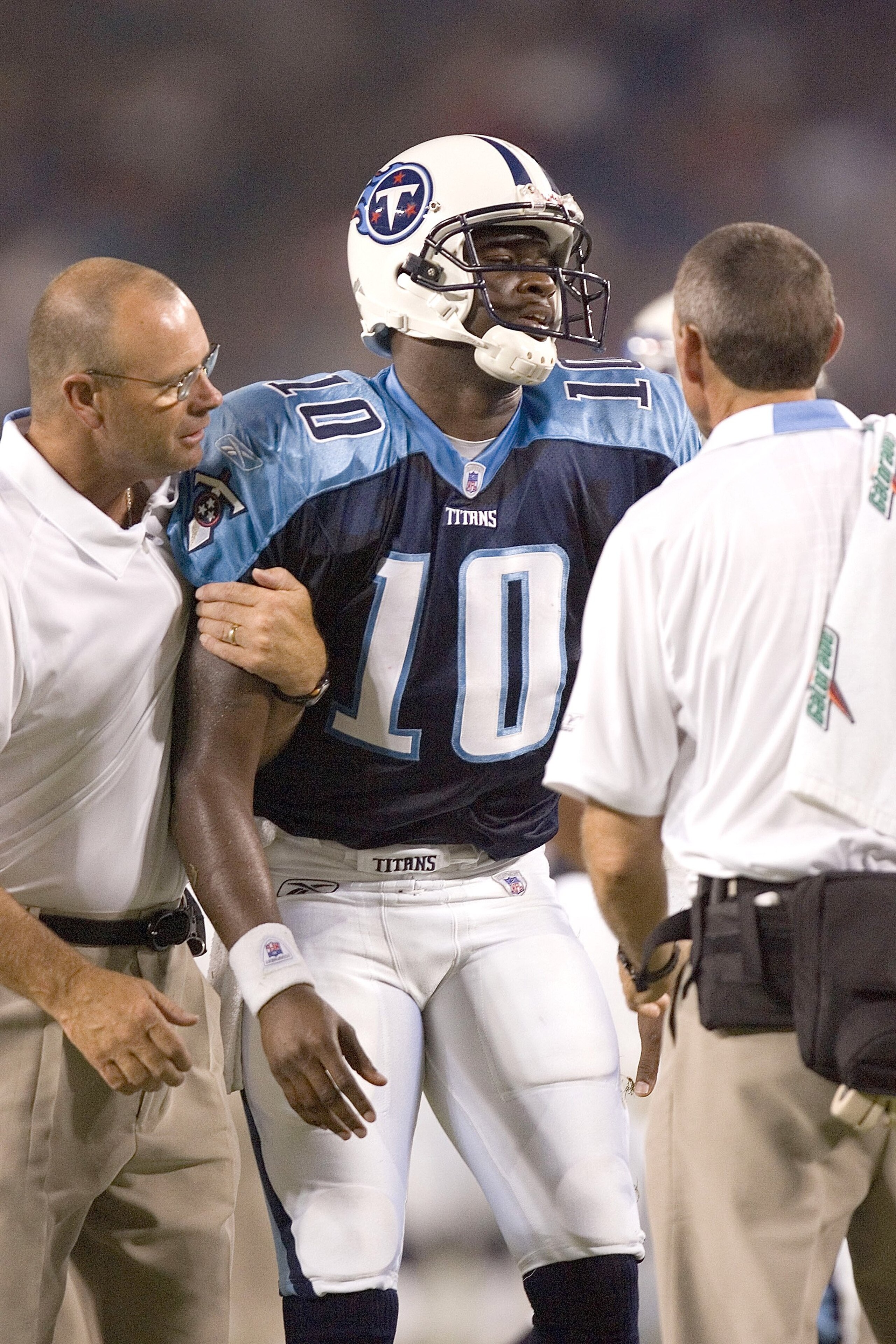 NASHVILLE, TN - AUGUST 12: Tennessee Titans quarterback Vince Young is helped off the field after hurting his ankle during a preseason game agaisnt the New Orleans Saints on August 12, 2006 at LP Field in Nashville, Tennessee. (Photo by Wesley Hitt/Getty NASHVILLE, TN - AUGUST 12: Tennessee Titans quarterback Vince Young is helped off the field after hurting his ankle during a preseason game agaisnt the New Orleans Saints on August 12, 2006 at LP Field in Nashville, Tennessee. (Photo by Wesley Hitt/Getty