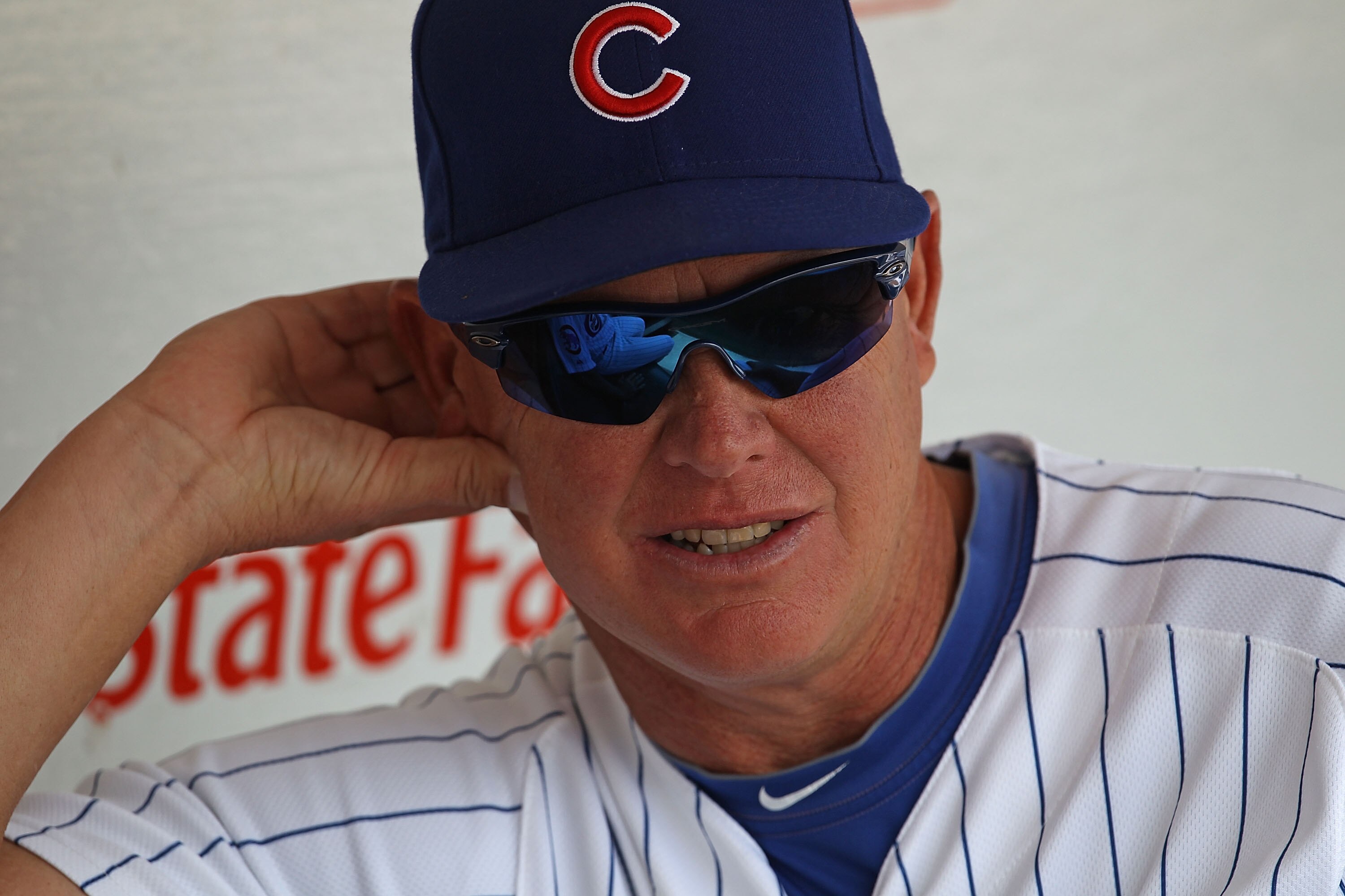 CHICAGO - SEPTEMBER 05: Interim manager Mike Quade #8 of the Chicago Cubs awaits the start of a game against the New York Mets at Wrigley Field on September 5, 2010 in Chicago, Illinois. (Photo by Jonathan Daniel/Getty Images)