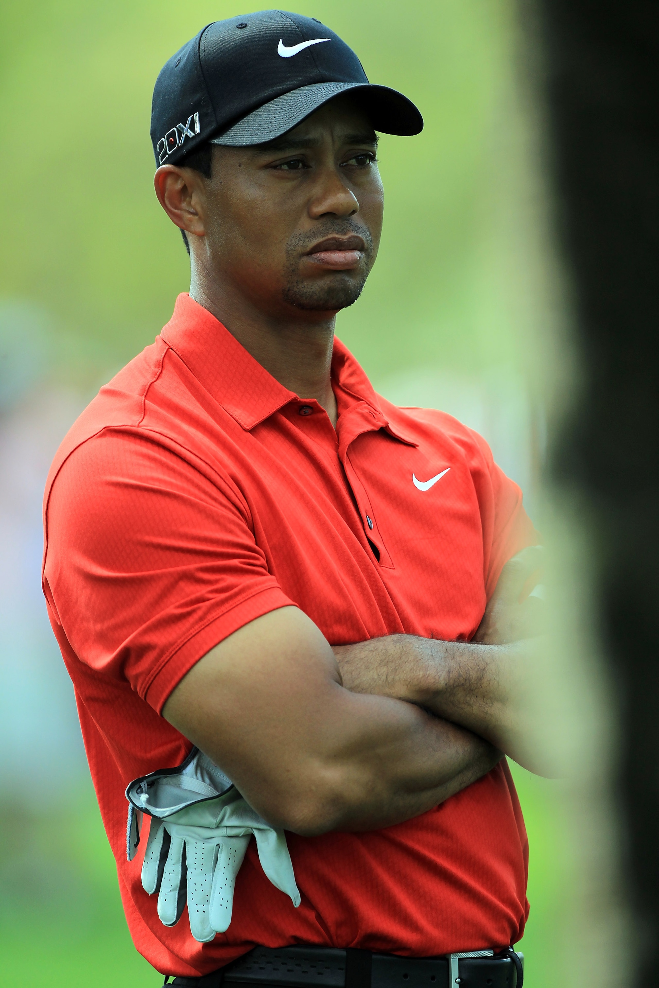 DUBAI, UNITED ARAB EMIRATES - FEBRUARY 13: Tiger Woods of the USA waits to play his second shot at the par 4, 1st hole during the final round of the 2011 Omega Dubai Desert Classic on the Majilis Course at the Emirates Golf Club on February 13, 2011 in D DUBAI, UNITED ARAB EMIRATES - FEBRUARY 13: Tiger Woods of the USA waits to play his second shot at the par 4, 1st hole during the final round of the 2011 Omega Dubai Desert Classic on the Majilis Course at the Emirates Golf Club on February 13, 2011 in D