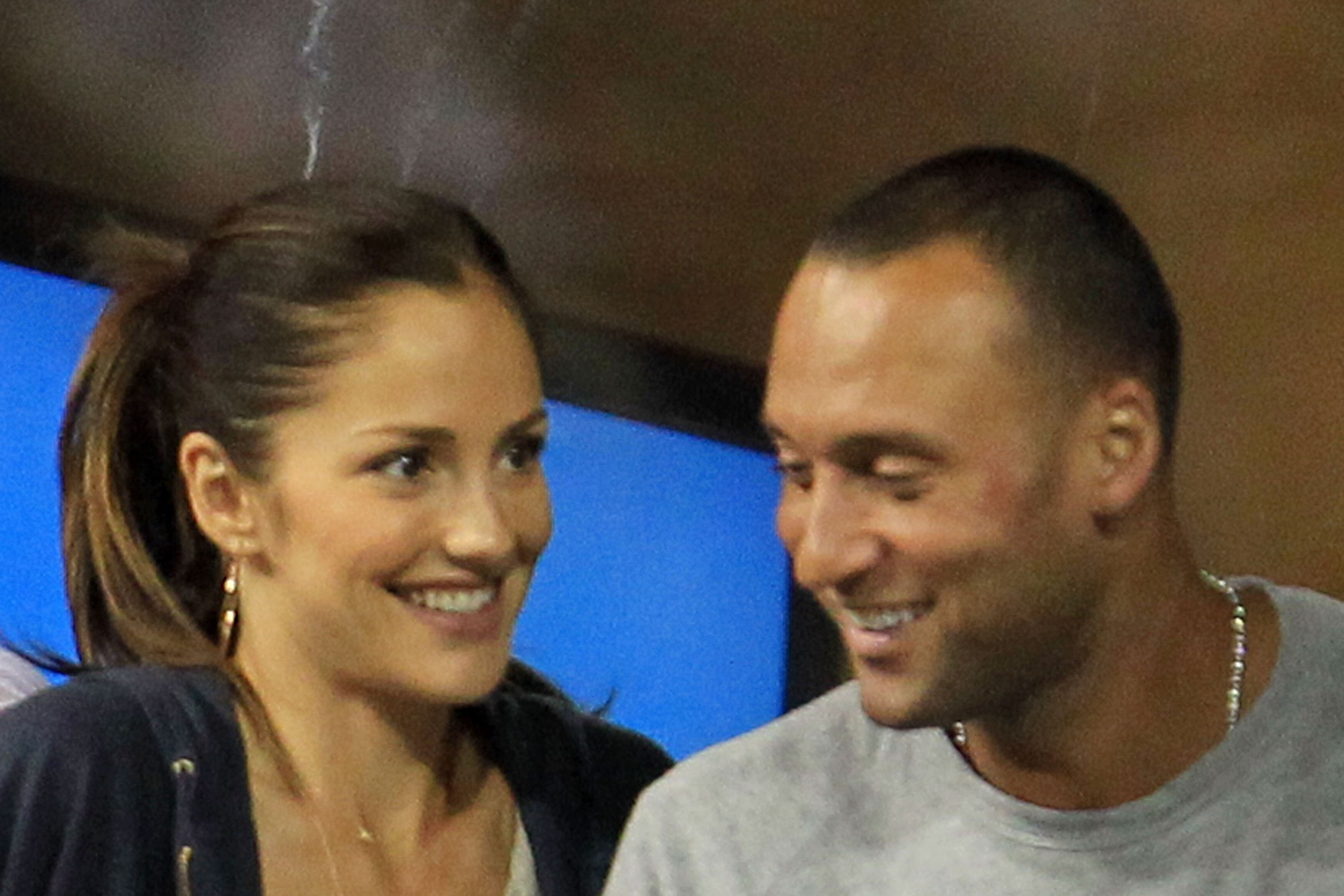 NEW YORK - SEPTEMBER 04:  Actress Minka Kelly and Derek Jeter of the New York Yanklees watch as Novak Djokovic of Serbia plays against James Blake of the United States during his men's singles match on day six of the 2010 U.S. Open at the USTA Billie Jean