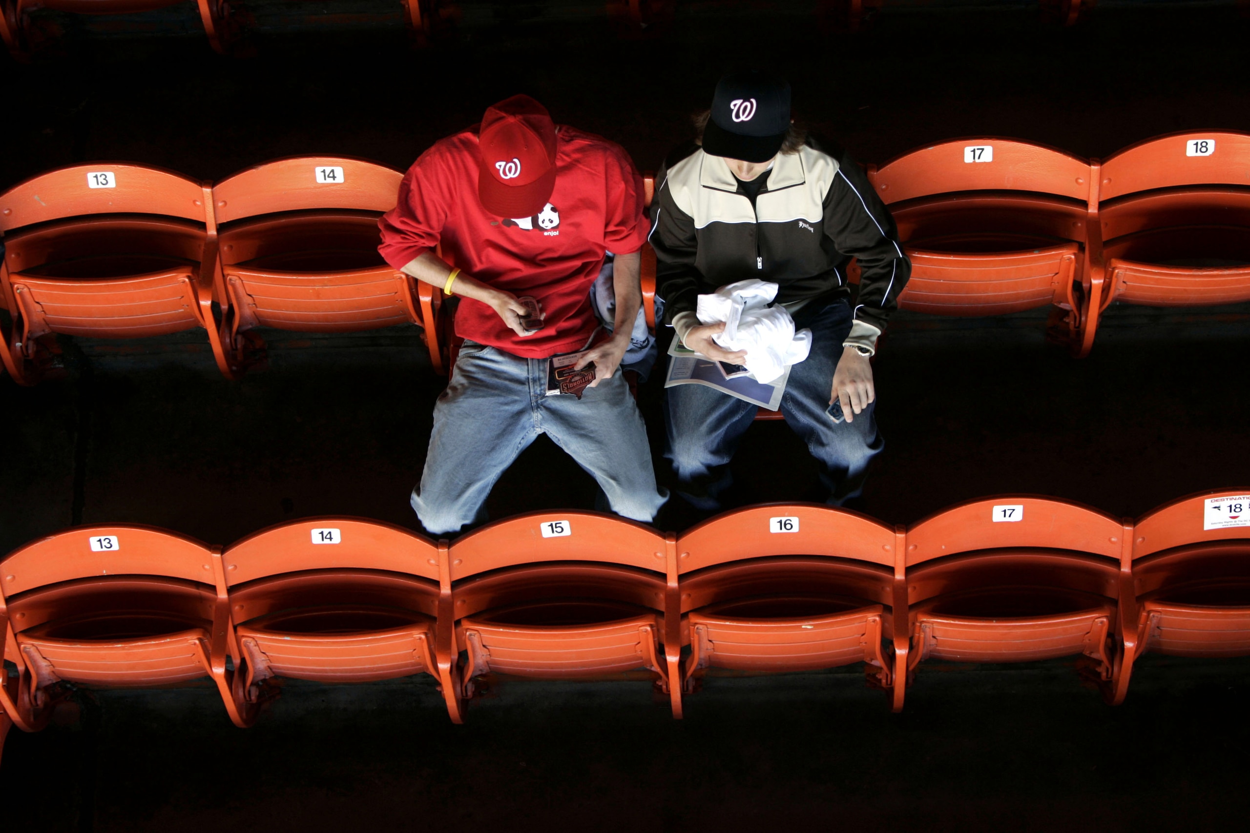 WASHINGTON - APRIL 14:  Fans of the Washington Nationals wait for the home opener to start against the Arizona Diamondbacks on April 14, 2005 at RFK Stadium in Washington, DC.  (Photo by Win McNamee/Getty Images)