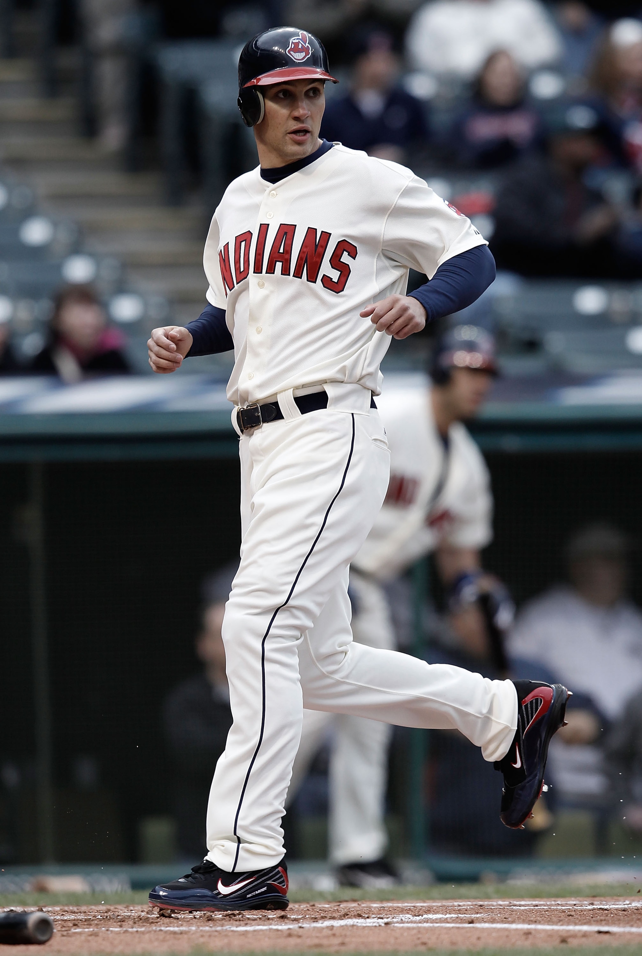 CLEVELAND - APRIL 17:  Grady Sizemore #24 of the Cleveland Indians crosses home plate after scoring in the first inning against the Chicago White Sox during the game on April 17, 2010 at Progressive Field in Cleveland, Ohio.  (Photo by Jared Wickerham/Get