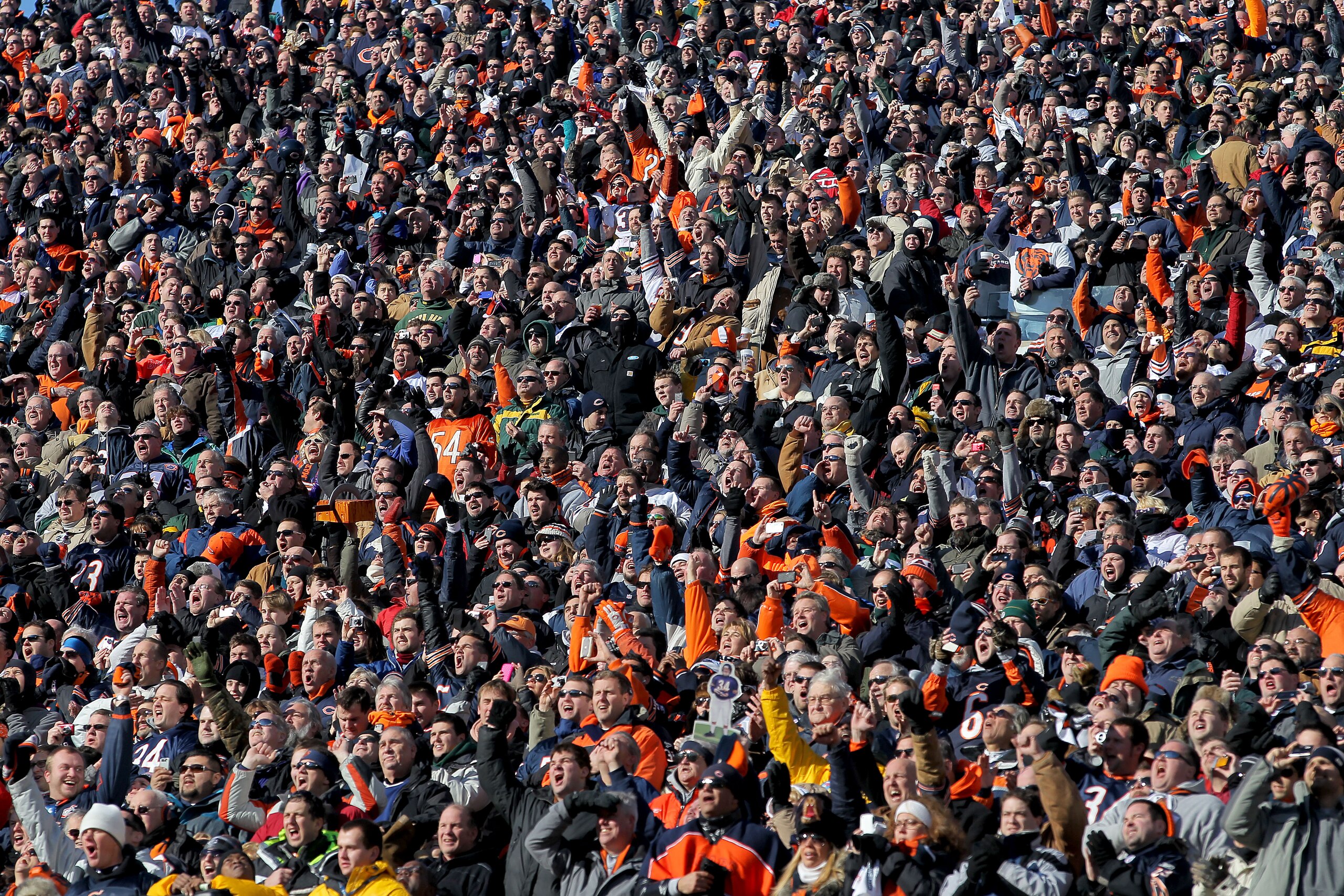 CHICAGO, IL - JANUARY 23:  Fans cheer in the NFC Championship Game between the Green Bay Packers and the Chicago Bears at Soldier Field on January 23, 2011 in Chicago, Illinois.  (Photo by Doug Pensinger/Getty Images)