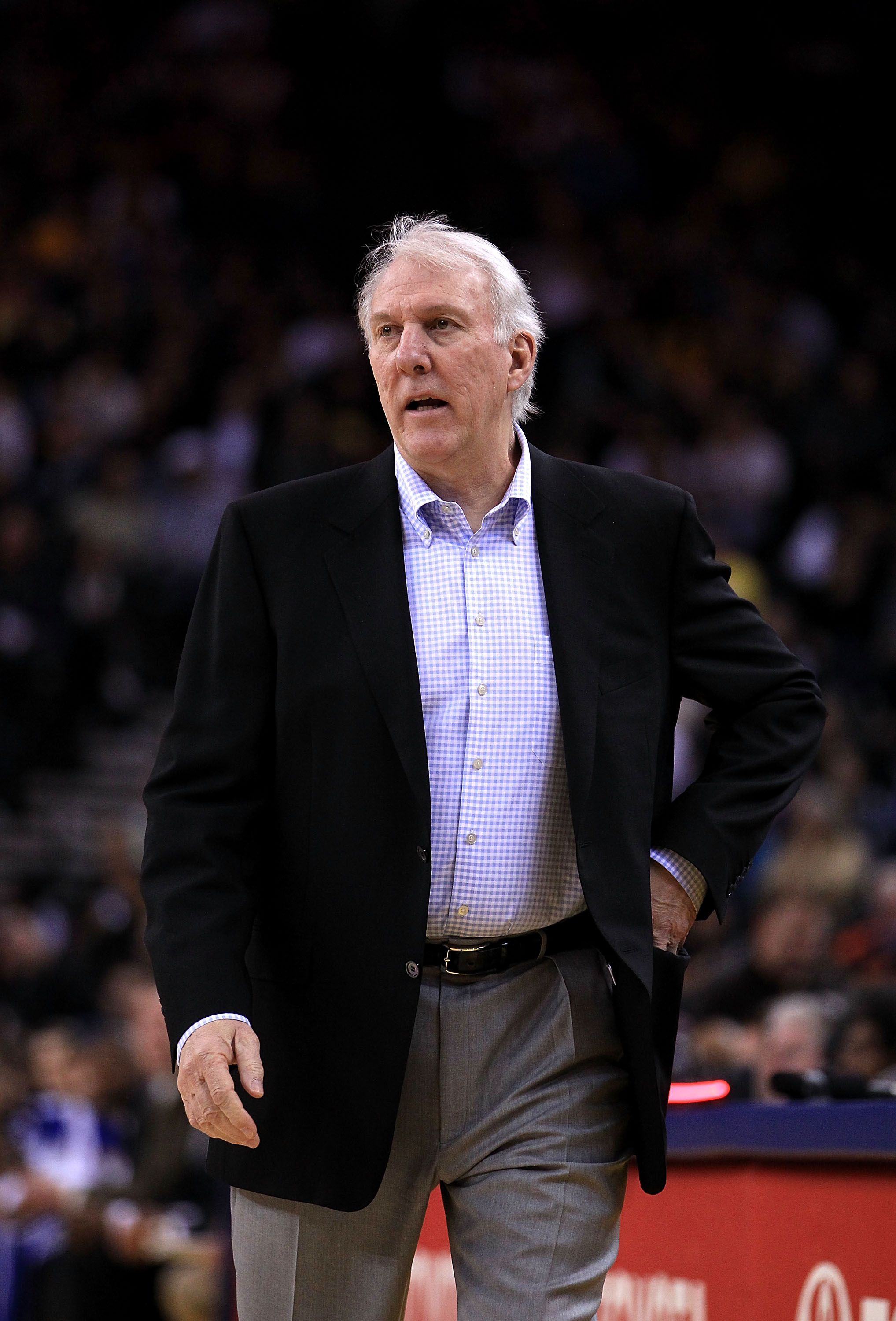 OAKLAND, CA - JANUARY 24:  Gregg Popovich of the San Antonio Spurs walks the sideline during their game against the Golden State Warriors at Oracle Arena on January 24, 2011 in Oakland, California.  NOTE TO USER: User expressly acknowledges and agrees tha