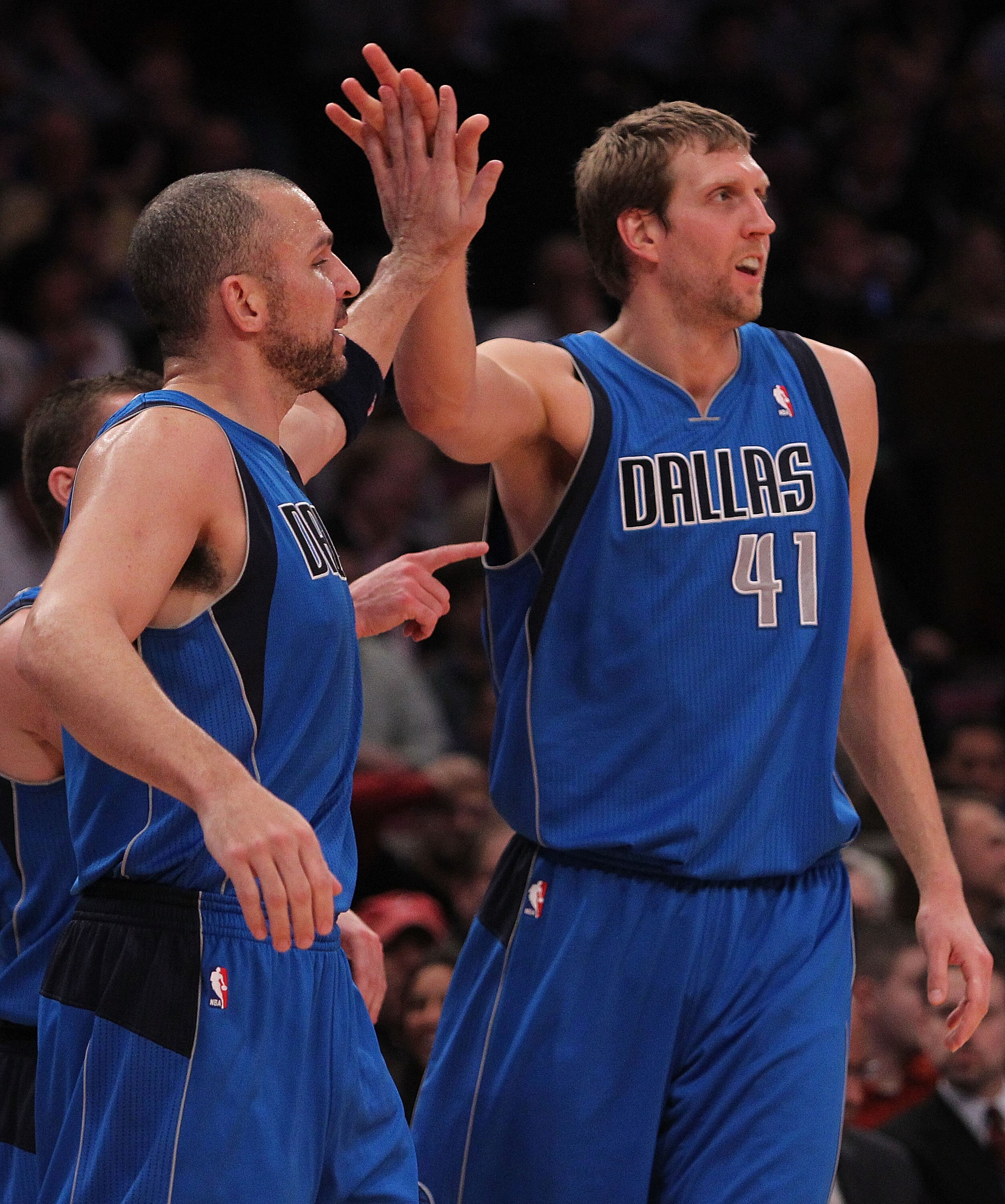 NEW YORK, NY - FEBRUARY 02:  Jason Kidd #2 of the Dallas Mavericks high fives team mate Dirk Nowitzki #41 against the New York Knicks at Madison Square Garden on February 2, 2011 in New York City. NOTE TO USER: User expressly acknowledges and agrees that,