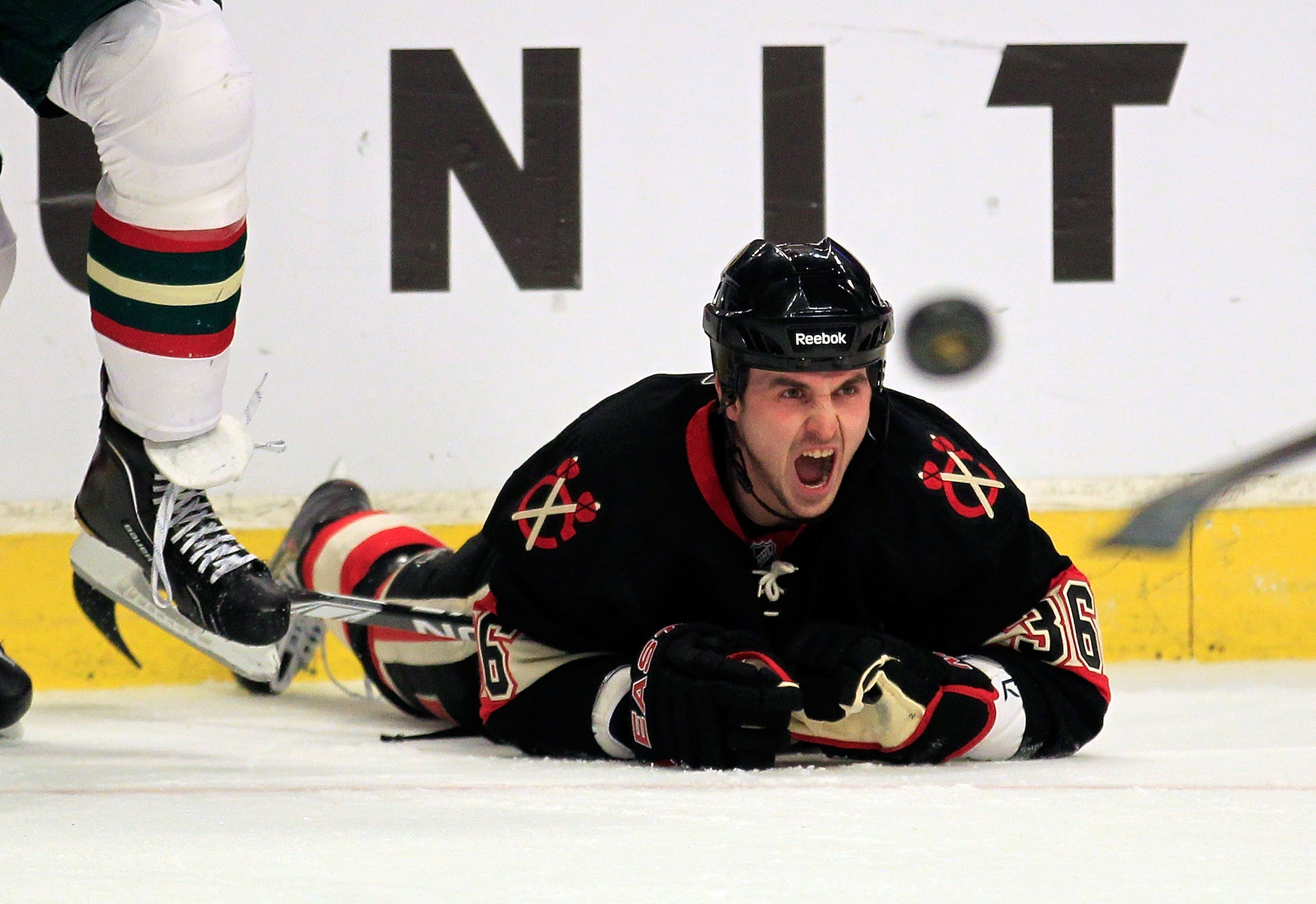 CHICAGO, IL - JANUARY 25: Dave Bolland #36 of the Chicago Blackhawks yells after being knocked to the ice against the Minnesota Wild at the United Center on January 25, 2011 in Chicago, Illinois. (Photo by Jonathan Daniel/Getty Images)