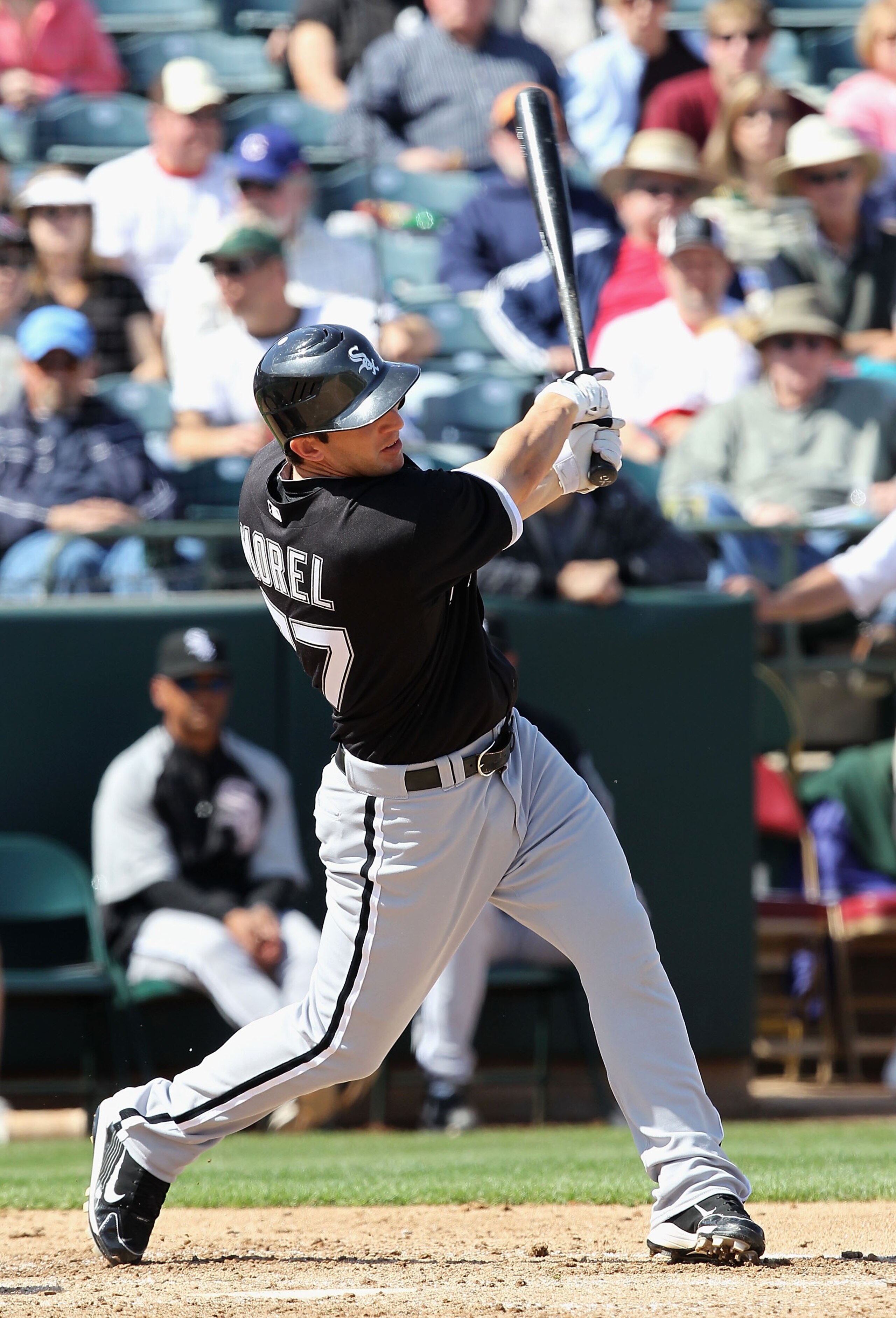 PHOENIX - MARCH 10:  Brent Morel #77 of the Chicago White Sox bats against the Oakland Athletics during the MLB spring training game at Phoenix Municipal Stadium on March 10, 2010 in Phoenix, Arizona. The White Sox defeated the A's 9-5  (Photo by Christia