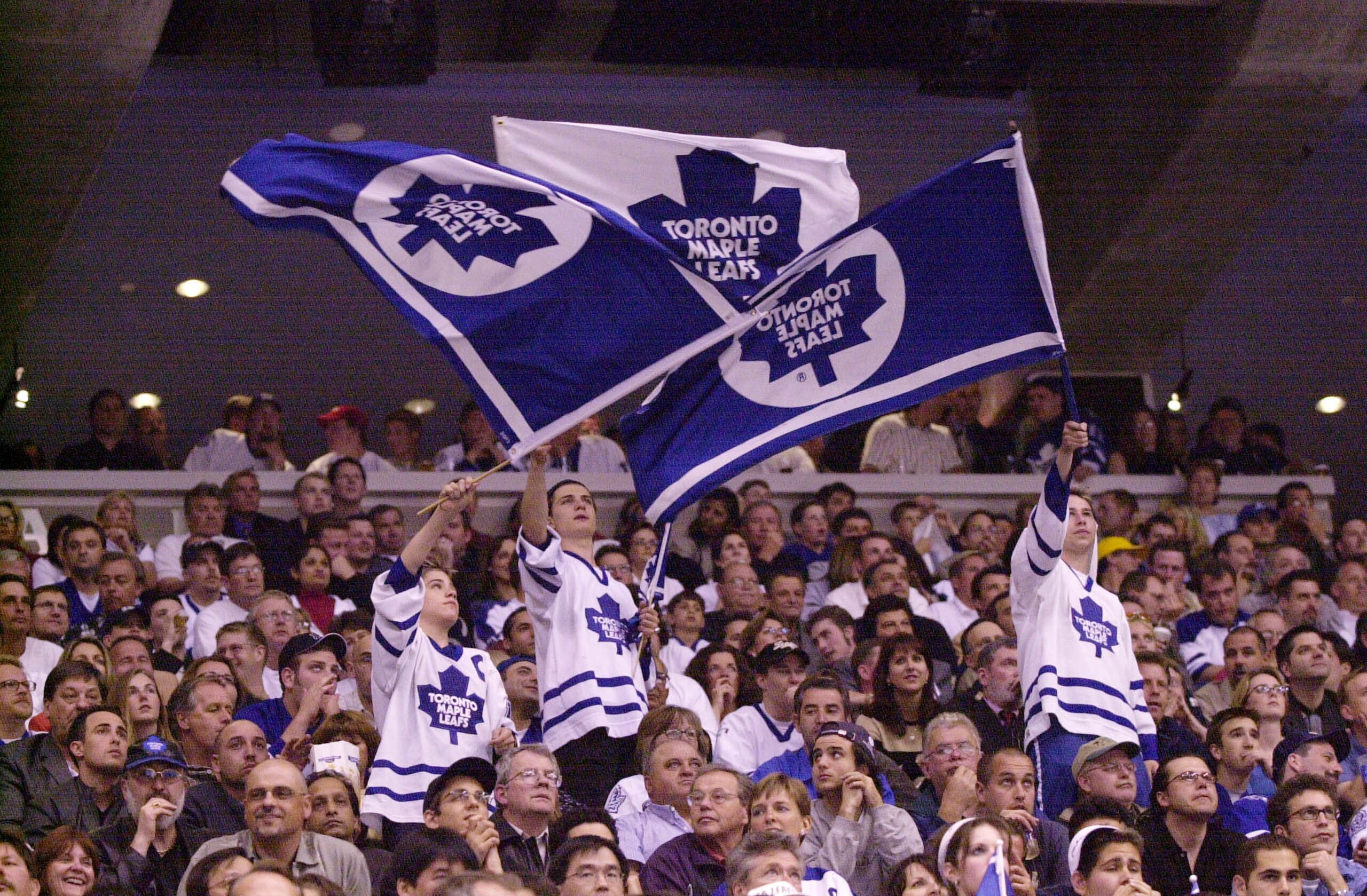 7 May 2001: Toronto Maple Leafs fans waves flags during game 6 of the Eastern Conference Semifinals against the New Jersey Devils at the Air Canada Center in Toronto, Ontario, Canada.  The Devils won 4-2. DIGITAL IMAGE.  Mandatory Credit: Harry How/ALLSPO
