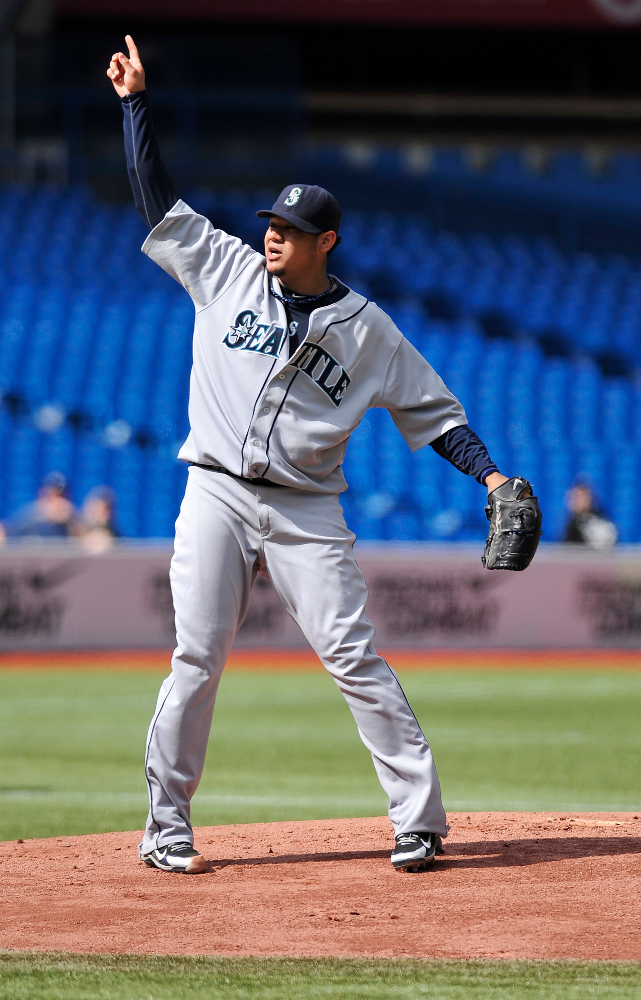 TORONTO - SEPTEMBER 23:   Felix Hernandez #34 of the Seattle Mariners points to a fly ball during the game against the Toronto Blue Jays on September 23, 2010 at Rogers Centre in Toronto, Ontario, Canada. The Blue Jays defeated the Mariners 1-0. (Photo by