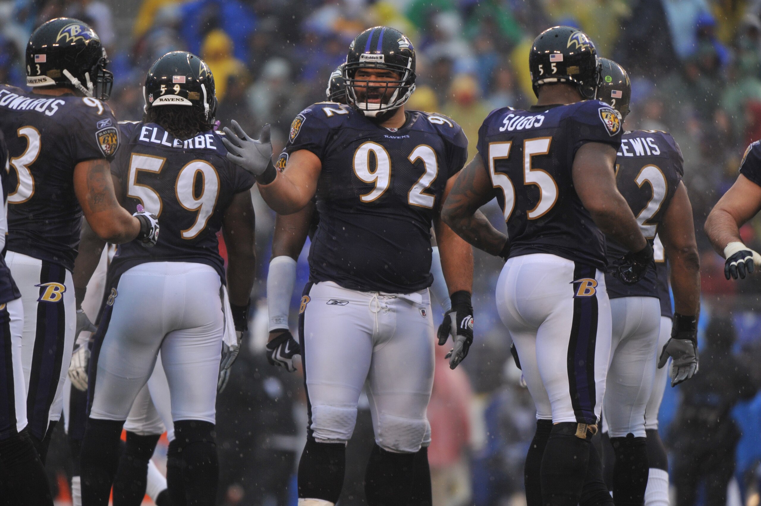 BALTIMORE - DECEMBER 13:  Haloti Ngata #92 of the Baltimore Ravens huddles with his teammates during the game against the Detroit Lions at M&T Bank Stadium on December 13, 2009 in Baltimore, Maryland. The Ravens defeated the Lions 48-3. (Photo by Larry Fr