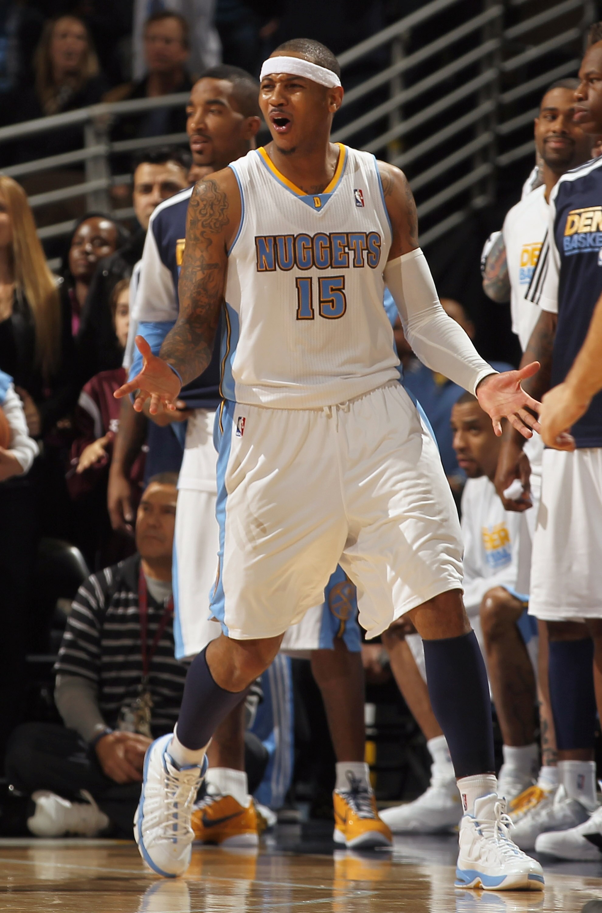 DENVER, CO - FEBRUARY 10:  Carmelo Anthony #15 of the Denver Nuggets reacts after fouling out of the game late in the fourth quarter after a foul on Dirk Nowitzki of the Dallas Mavericks during NBA action at the Pepsi Center on February 10, 2011 in Denver