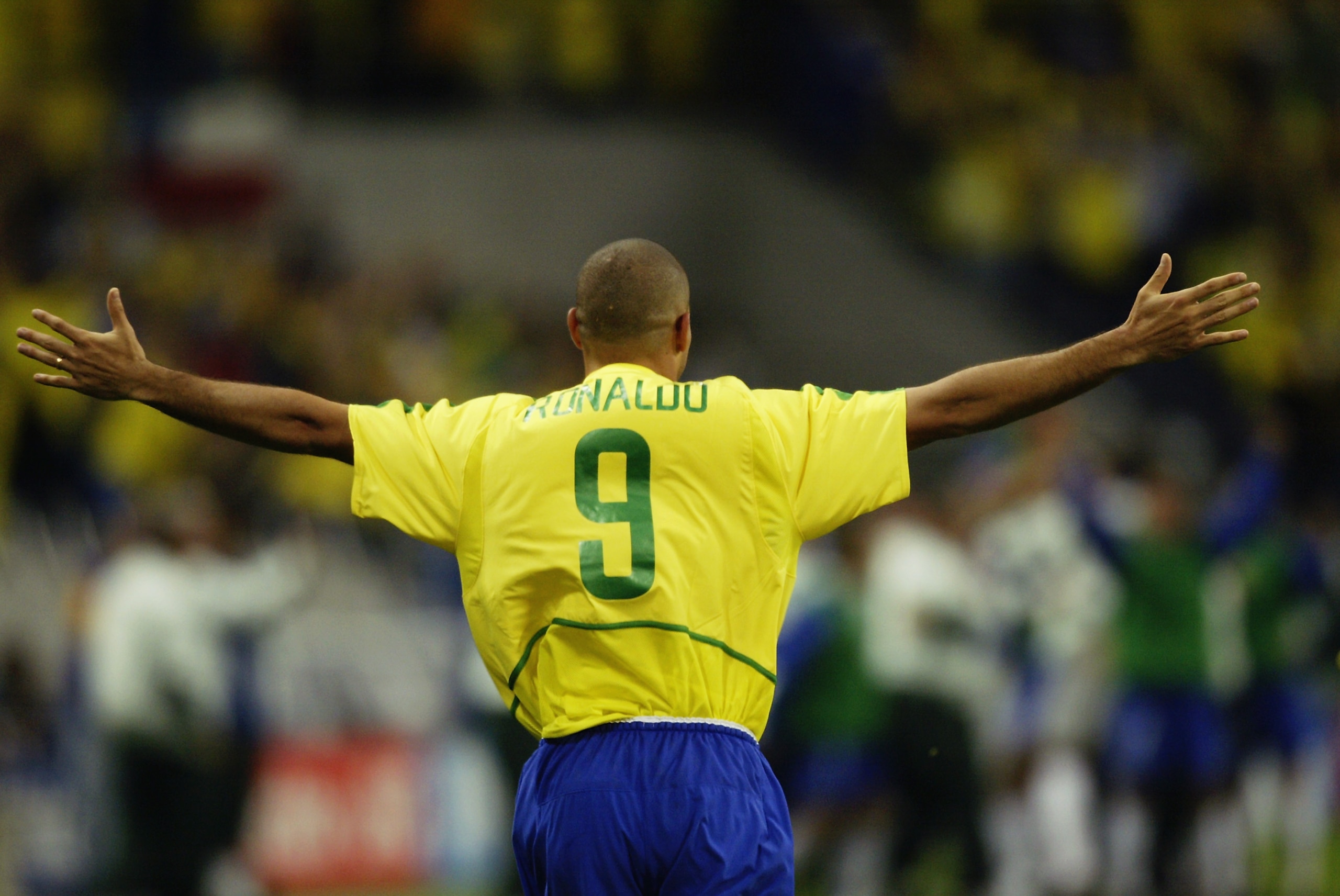 SAITAMA-KEN - JUNE 26: Ronaldo of Brazil celebrates scoring the winning goal during the FIFA World Cup Finals 2002 Semi-Final match between Brazil and Turkey played at the Saitama Stadium, in Saitama-Ken, Japan on June 26, 2002. Brazil won the match 1-0. SAITAMA-KEN - JUNE 26: Ronaldo of Brazil celebrates scoring the winning goal during the FIFA World Cup Finals 2002 Semi-Final match between Brazil and Turkey played at the Saitama Stadium, in Saitama-Ken, Japan on June 26, 2002. Brazil won the match 1-0.