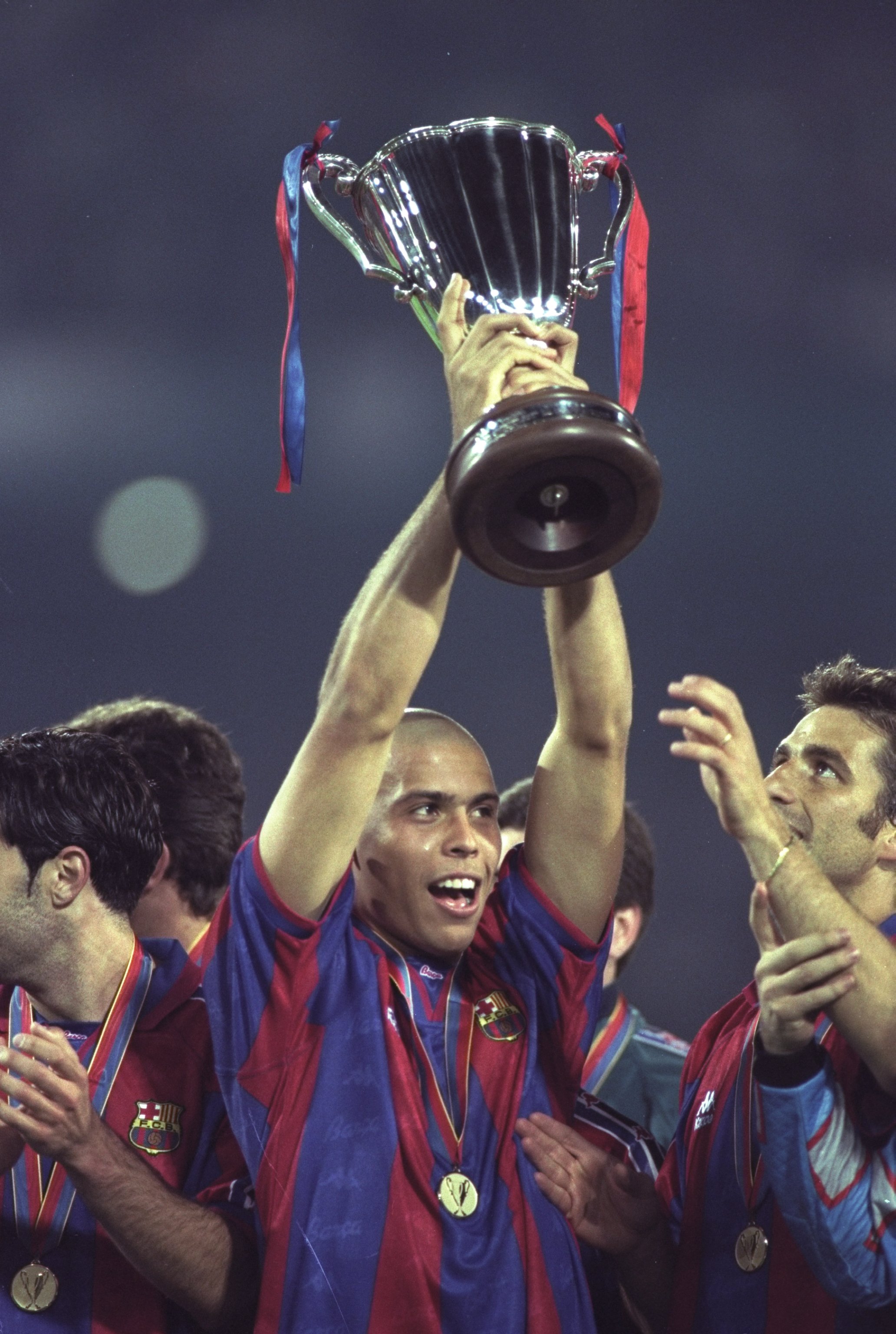14 May 1997:  Ronaldo of Barcelona holds aloft the European Cup Winners Cup after victory against Paris St Germain in Rotterdam, Holland. Barcelona won 1-0. \ Mandatory Credit: Stu Forster /Allsport