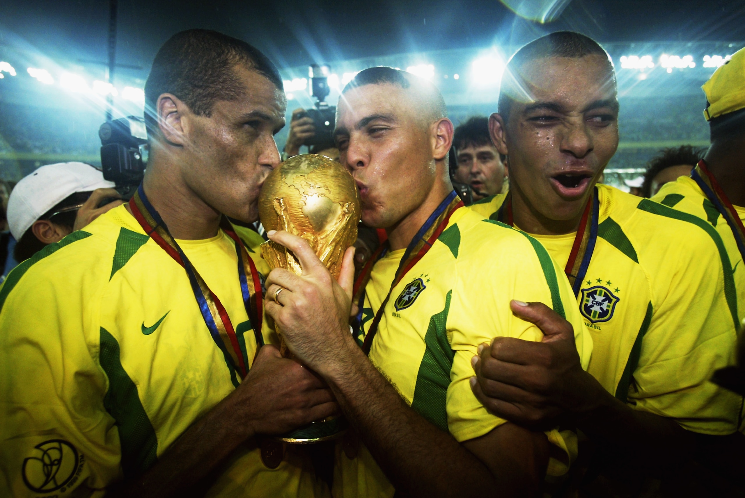 YOKOHAMA - JUNE 30: Rivaldo and Ronaldo of Brazil kiss the trophy after the Germany v Brazil, World Cup Final match played at the International Stadium Yokohama in Yokohama, Japan on June 30, 2002. Brazil won 2-0. (Photo by Alex Livesey/Getty Images) YOKOHAMA - JUNE 30: Rivaldo and Ronaldo of Brazil kiss the trophy after the Germany v Brazil, World Cup Final match played at the International Stadium Yokohama in Yokohama, Japan on June 30, 2002. Brazil won 2-0. (Photo by Alex Livesey/Getty Images)