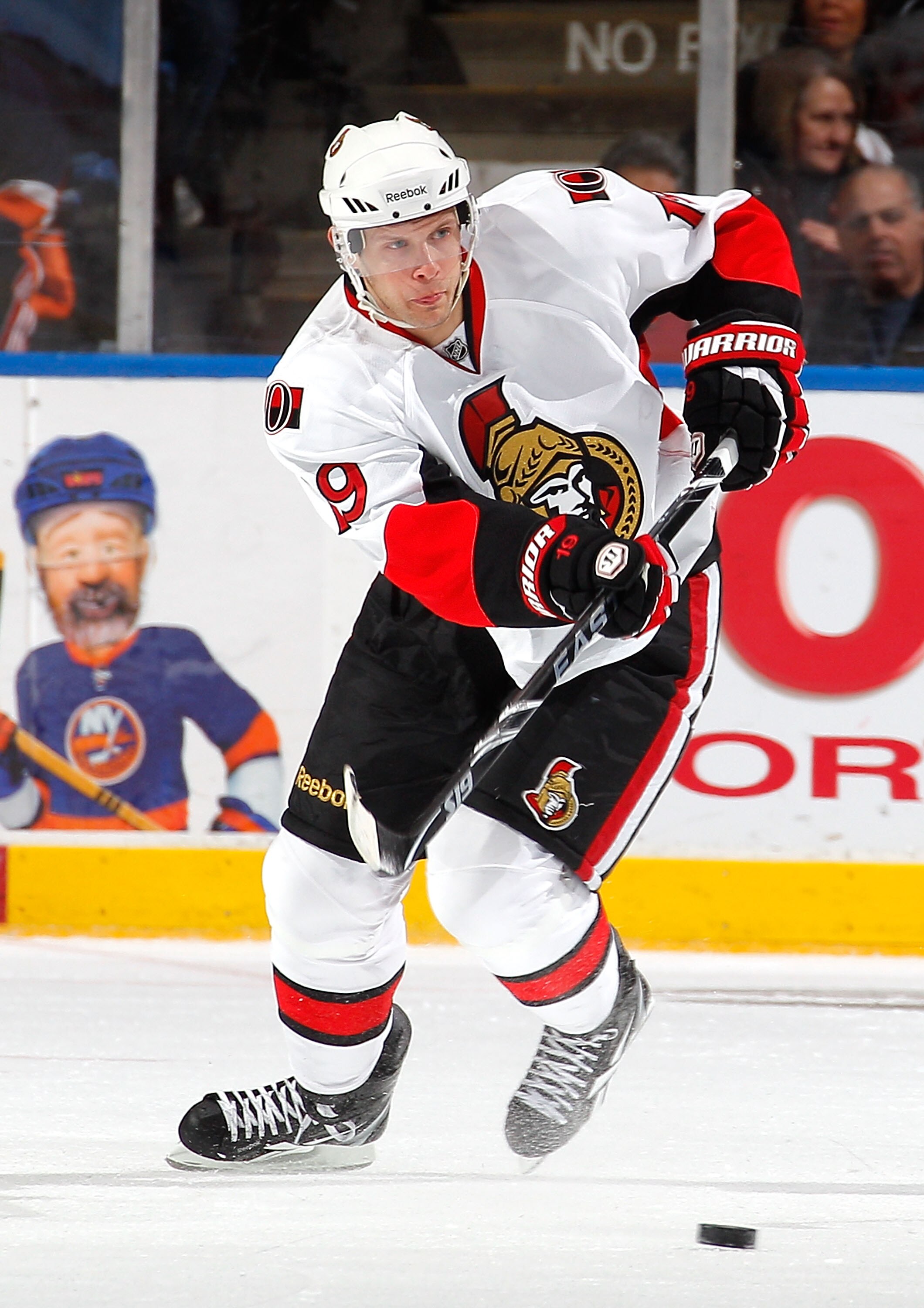 UNIONDALE, NY - FEBRUARY 05:  Jason Spezza #19 of the Ottawa Senators passes during an NHL hockey game against the New York Islanders at Nassau Coliseum on February 5, 2011 in Uniondale, New York.  (Photo by Paul Bereswill/Getty Images)