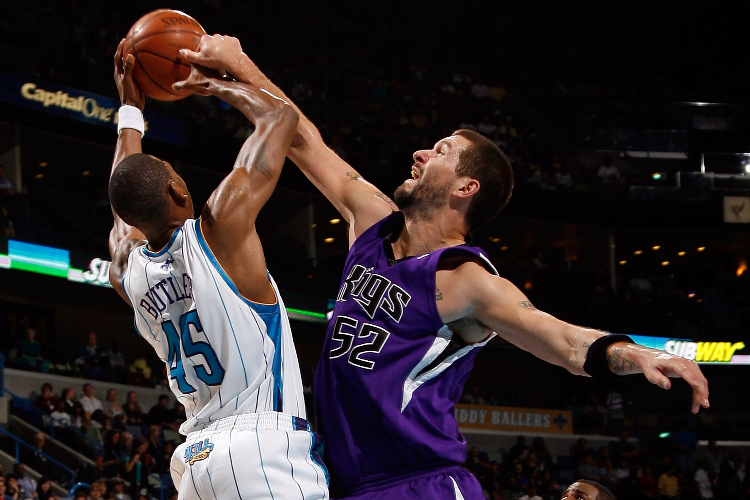 NEW ORLEANS - DECEMBER 20:  Brad Miller #52 of the Sacramento Kings fights for a rebound with Rasual Butler #45 of the New Orleans Hornets on December 20, 2008 in New Orleans, Louisiana.   The Hornets defeated the Kings 99-90.   NOTE TO USER: User express