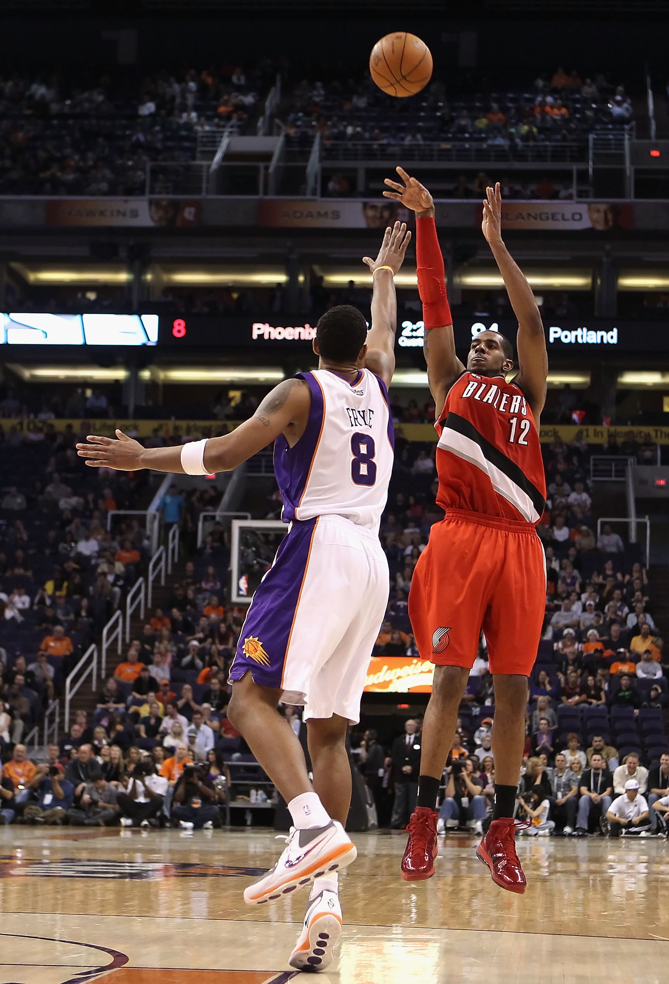 PHOENIX - DECEMBER 10:  LaMarcus Aldridge #12 of the Portland Trail Blazers puts up a shot during the NBA game against the Phoenix Suns at US Airways Center on December 10, 2010 in Phoenix, Arizona. The Trail Blazers defeated the Suns 101-94.  NOTE TO USE