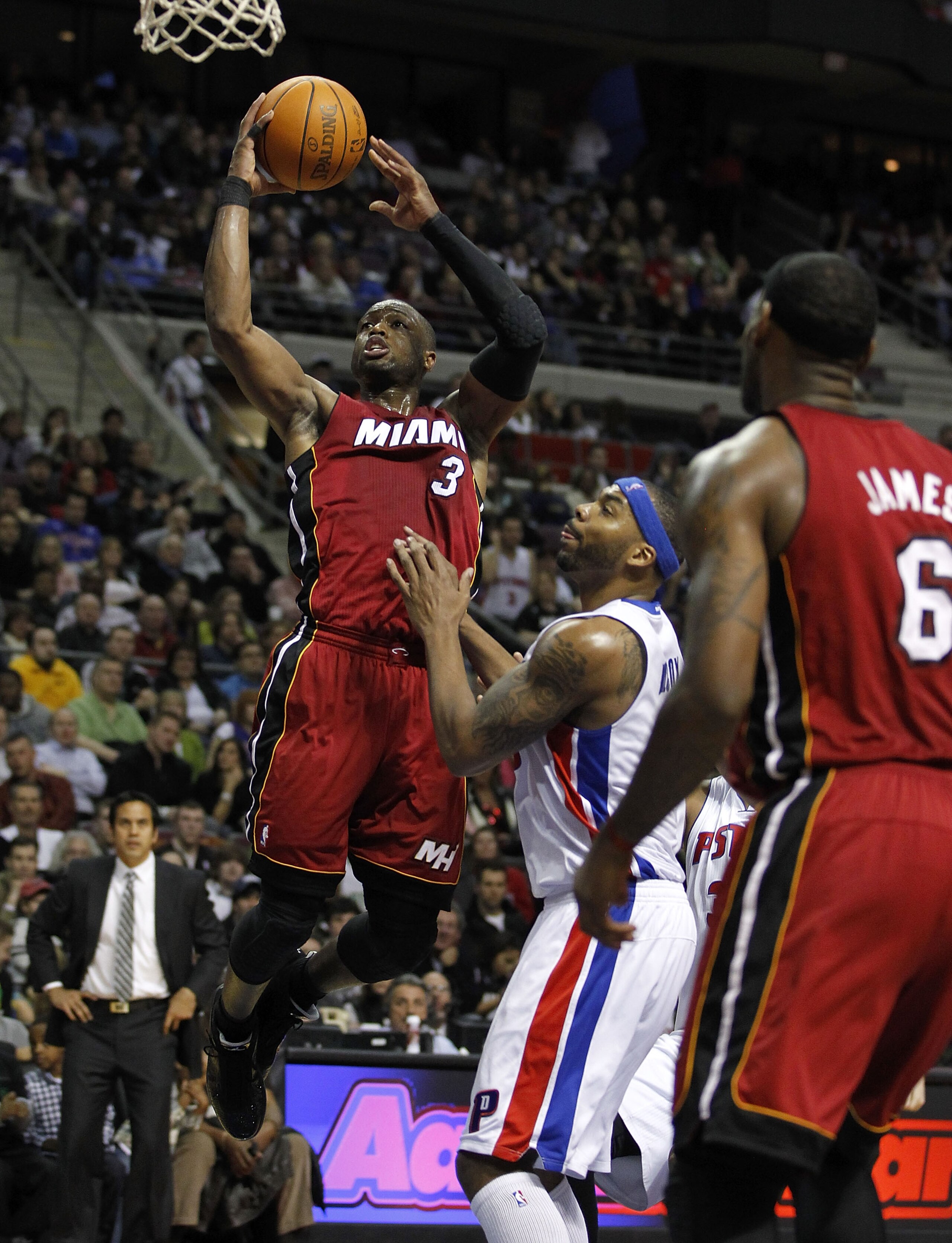 AUBURN HILLS, MI - FEBRUARY 11:  Dwyane Wade #3 of the Miami Heat gets to the basket in front of Chris Wilcox #9 of the Detroit Pistons at The Palace of Auburn Hills on February 11, 2011 in Auburn Hills, Michigan.  NOTE TO USER: User expressly acknowledge