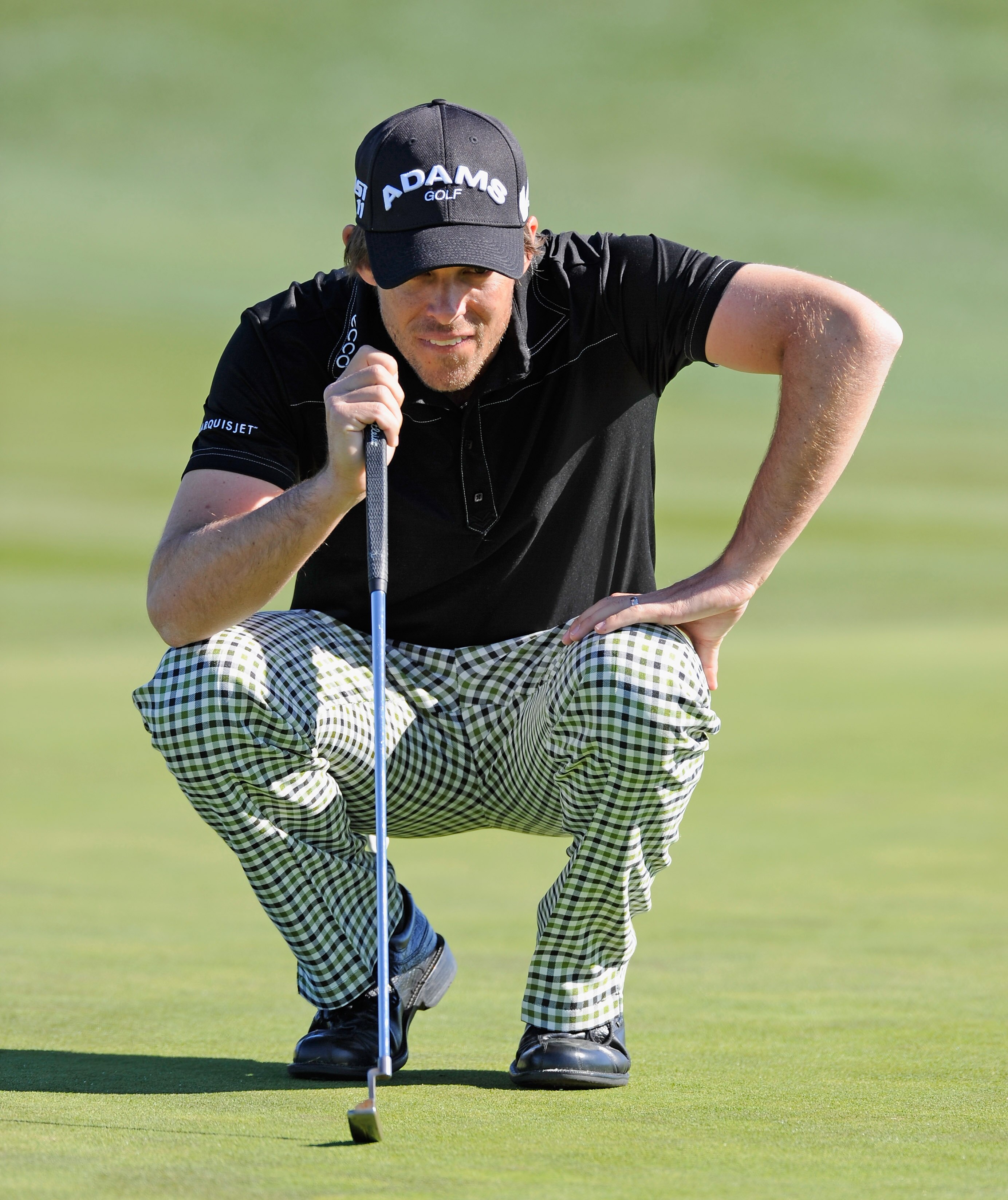 PEBBLE BEACH, CA - FEBRUARY 11:  Aaron Baddeley of Australia lines up his putt on the sixth hole during the second round of the AT&T Pebble Beach National Pro-Am at the Pebble Beach Golf Links on February 11, 2011  in Pebble Beach, California  (Photo by S