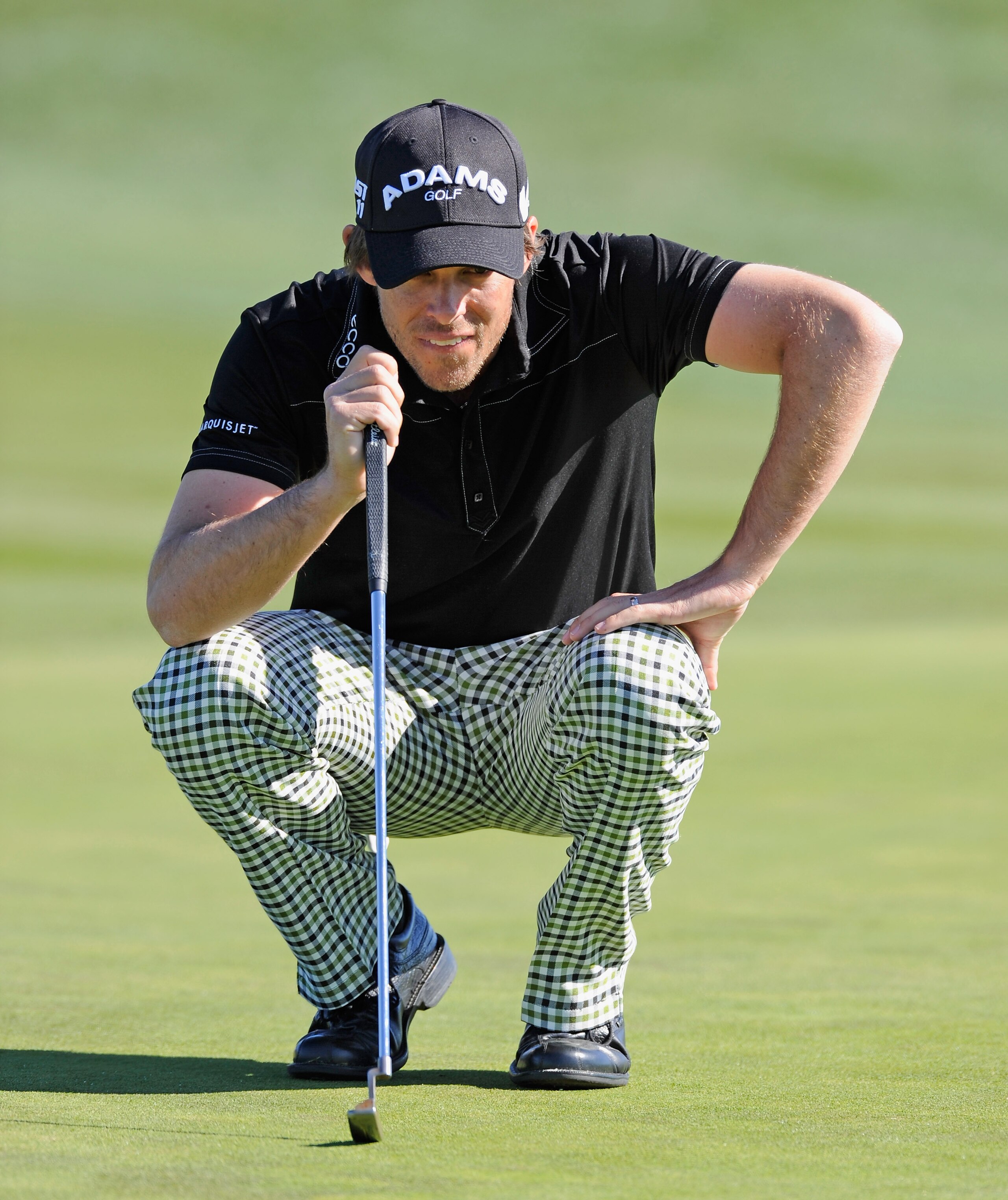 PEBBLE BEACH, CA - FEBRUARY 11:  Aaron Baddeley of Australia lines up his putt on the sixth hole during the second round of the AT&T Pebble Beach National Pro-Am at the Pebble Beach Golf Links on February 11, 2011  in Pebble Beach, California  (Photo by S