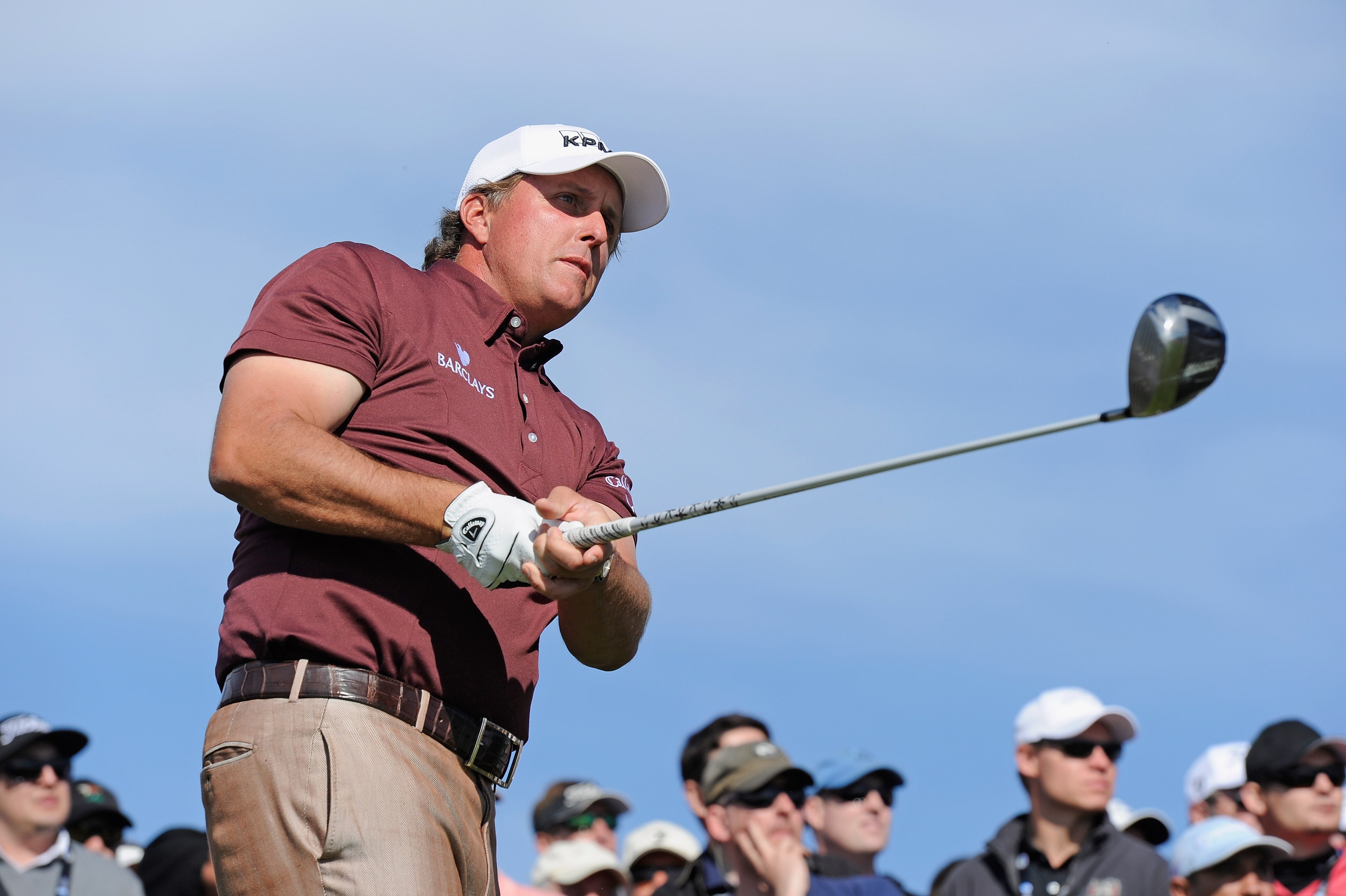 PEBBLE BEACH, CA - FEBRUARY 13:  Phil Mickelson plays his tee shot on the nineth hole during the final round of the AT&T Pebble Beach National Pro-Am at Pebble Beach Golf Links on February 13, 2011  in Pebble Beach, California.  (Photo by Stuart Franklin/