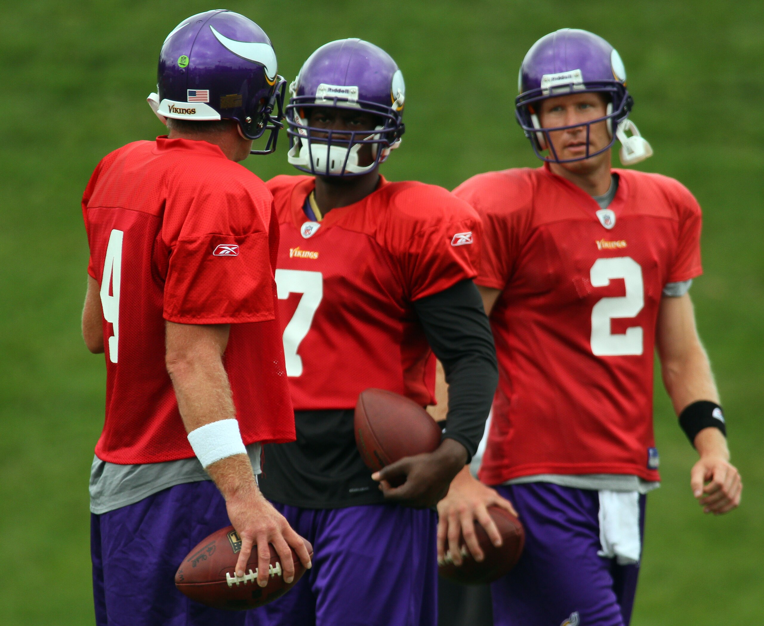 EDEN PRAIRIE, MN - AUGUST 18: Quarterbacks Brett Favre #4, Tarvaris Jackson #7 and Sage Rosenfels #2 of the Minnesota Vikings participate in Favre's first morning practice since returning to Vikings Winter Park on August 18, 2010 in Eden Prairie, Minnesot