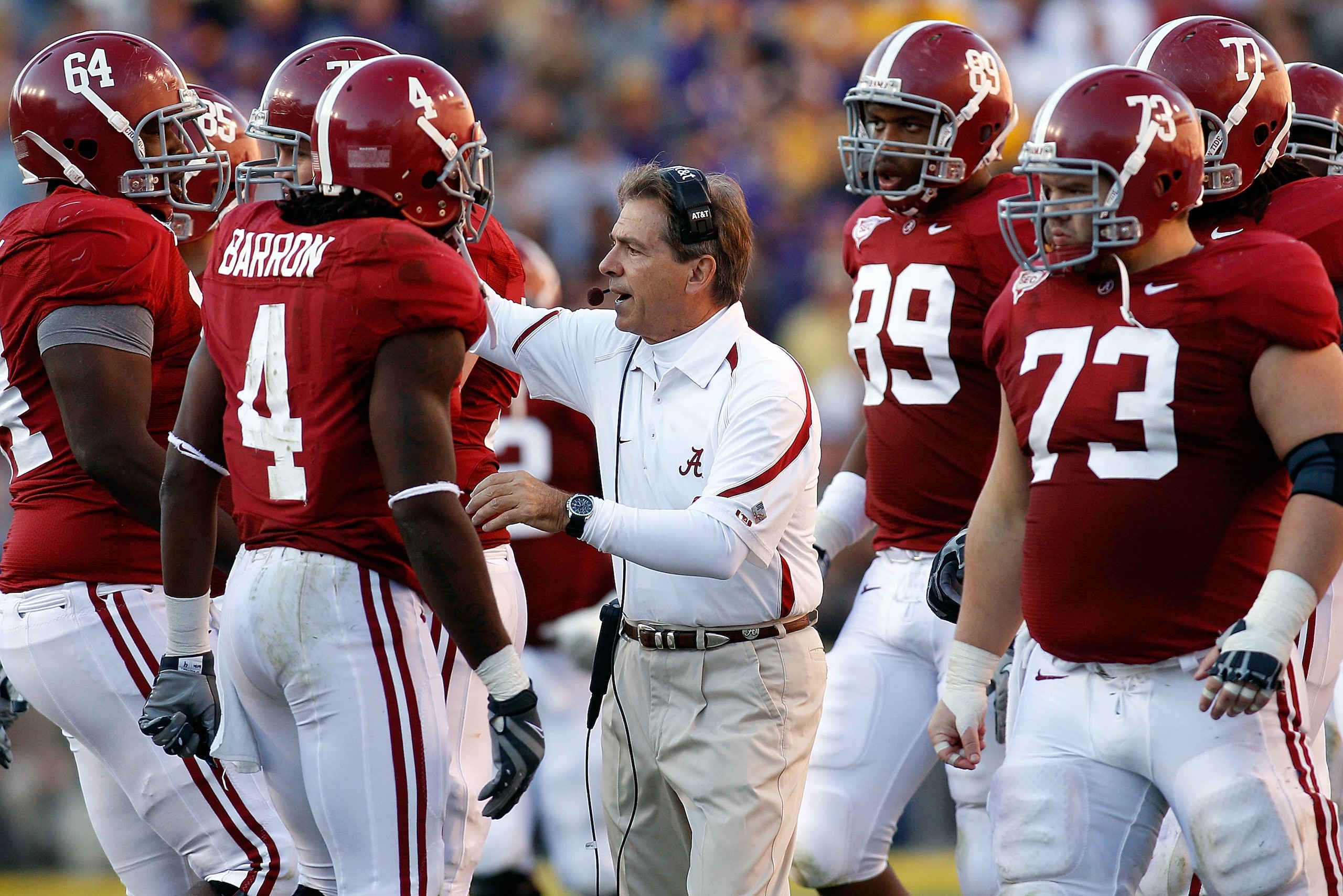BATON ROUGE, LA - NOVEMBER 06:  Head coach Nick Saban of the Alabama Crimson Tide talks with his team during the game against the Louisiana State University Tigers at Tiger Stadium on November 6, 2010 in Baton Rouge, Louisiana. The Tigers defeated the Cri