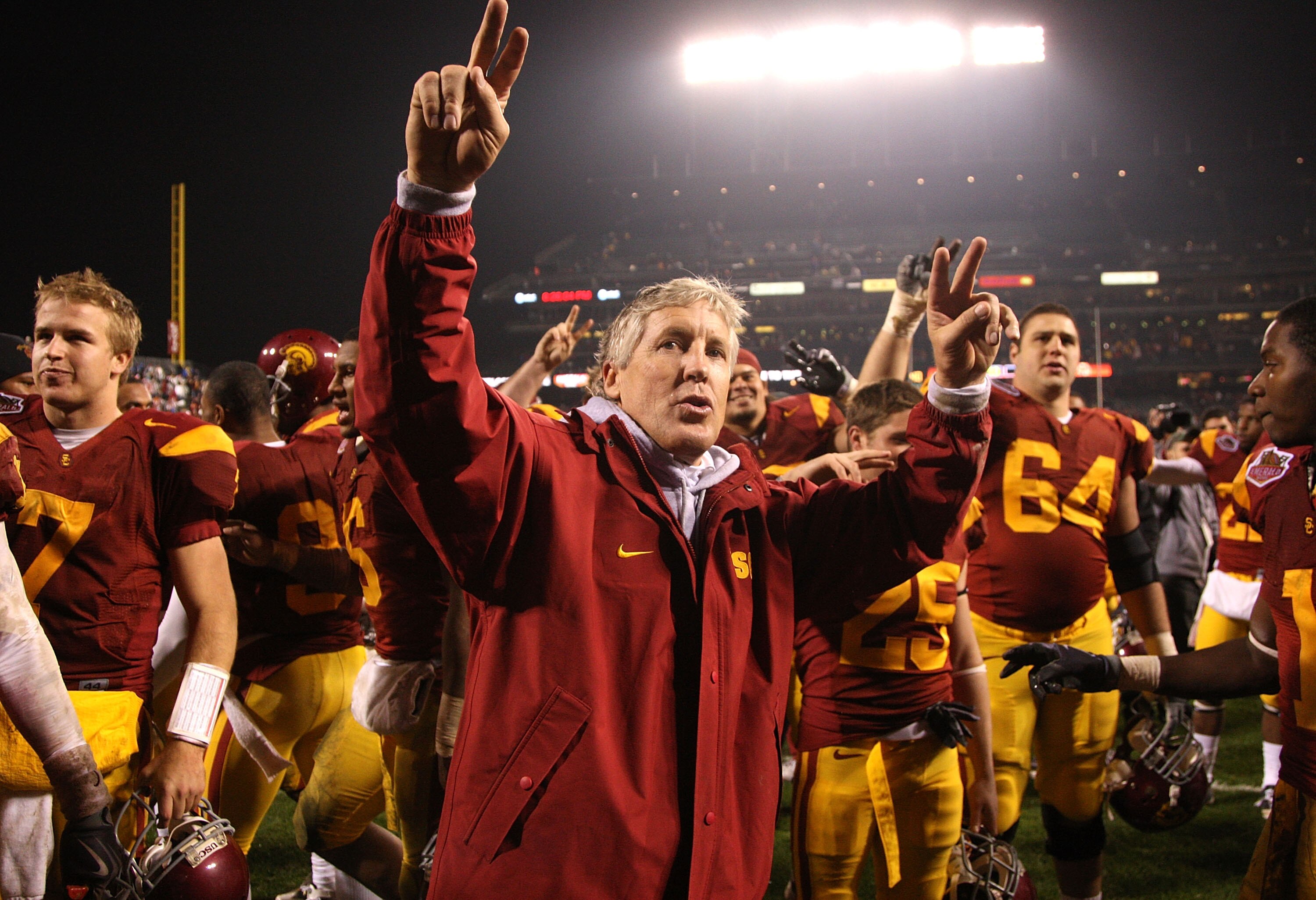 SAN FRANCISCO - DECEMBER 26: Head coach Pete Carroll of the USC Trojans celebrates after defeating the Boston College Eagles during the 2009 Emerald Bowl at AT&T Park on December 26, 2009 in San Francisco, California. (Photo by Jed Jacobsohn/Getty Images)