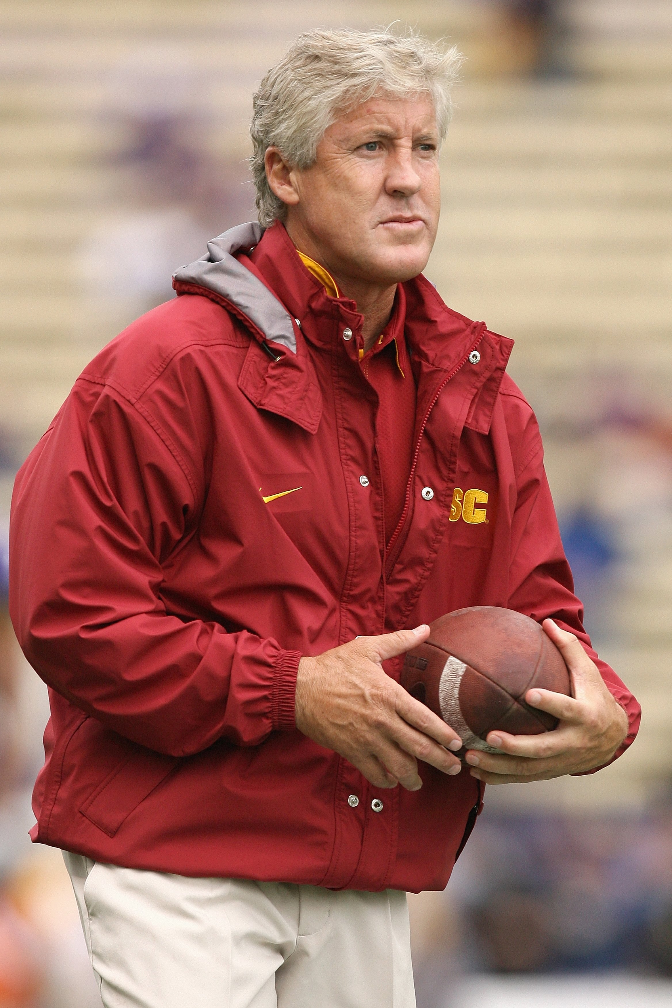 SEATTLE - SEPTEMBER 19: Head coach Pete Carroll of the USC Trojans watches warm ups before the game against the Washington Huskies on September 19, 2009 at Husky Stadium in Seattle, Washington. The Huskies defeated the Trojans 16-13. (Photo by Otto Greule