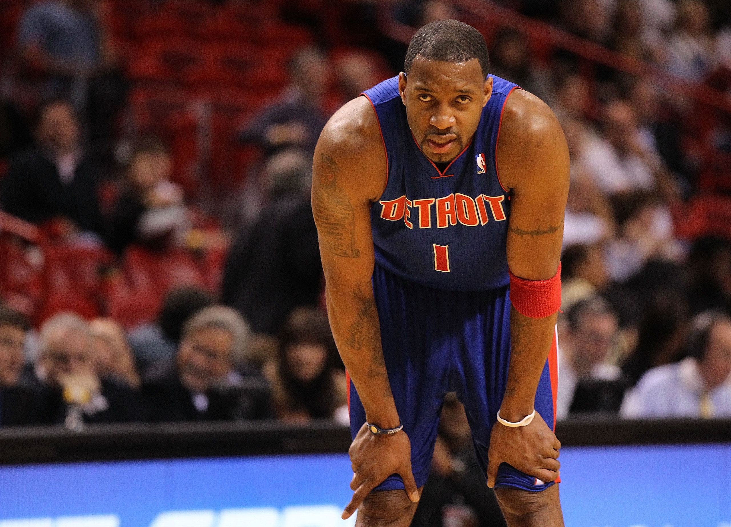 MIAMI, FL - JANUARY 28: Tracy McGrady #1 of of the Detroit Pistons looks on during a game against the Miami Heat at American Airlines Arena on January 28, 2011 in Miami, Florida. NOTE TO USER: User expressly acknowledges and agrees that, by downloading an
