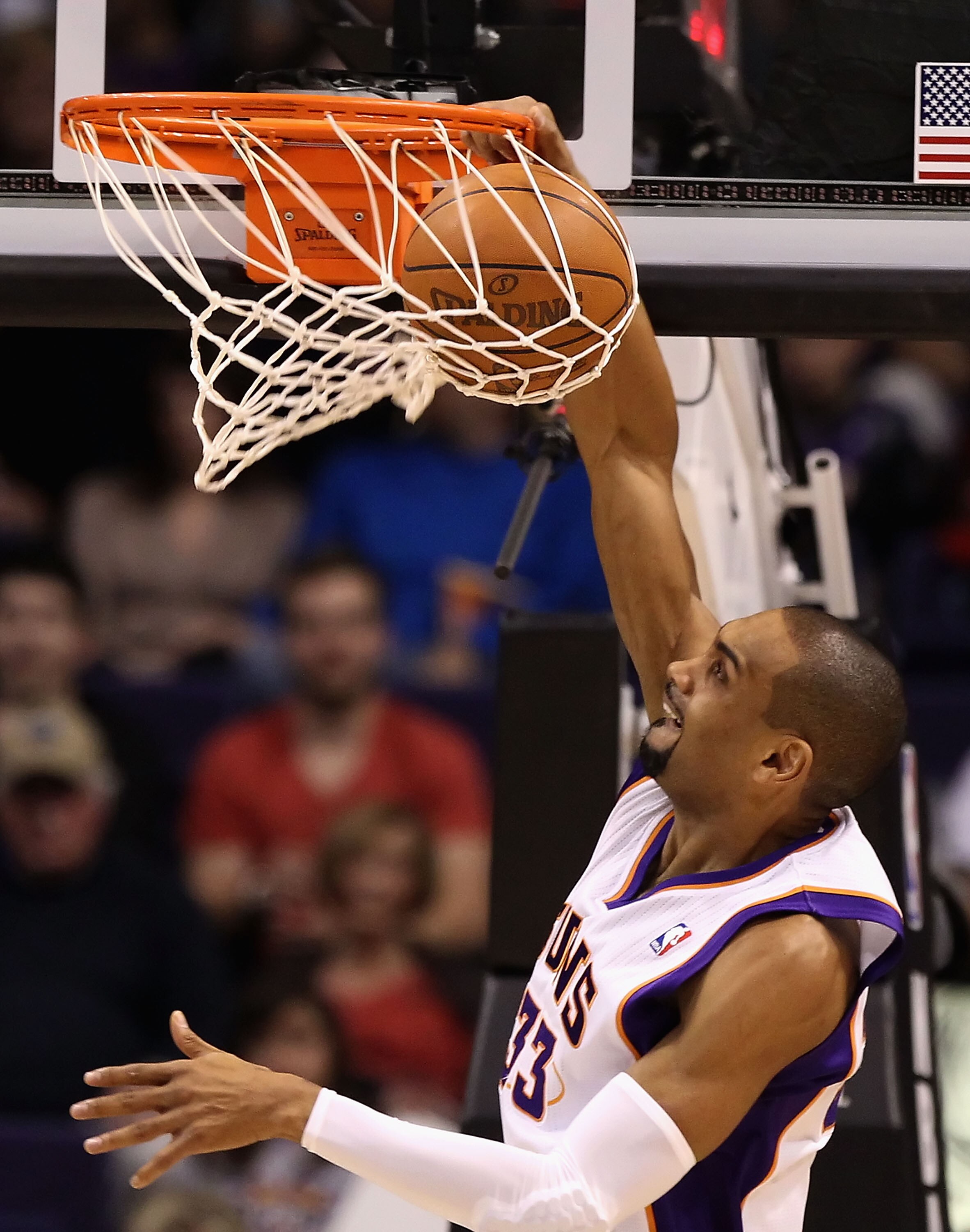 PHOENIX, AZ - JANUARY 14:  Grant Hill #33 of the Phoenix Suns slam dunks the ball during the NBA game against the Portland Trail Blazers at US Airways Center on January 14, 2011 in Phoenix, Arizona. The Suns defeated the Trail Blazers 115-111. NOTE TO USE