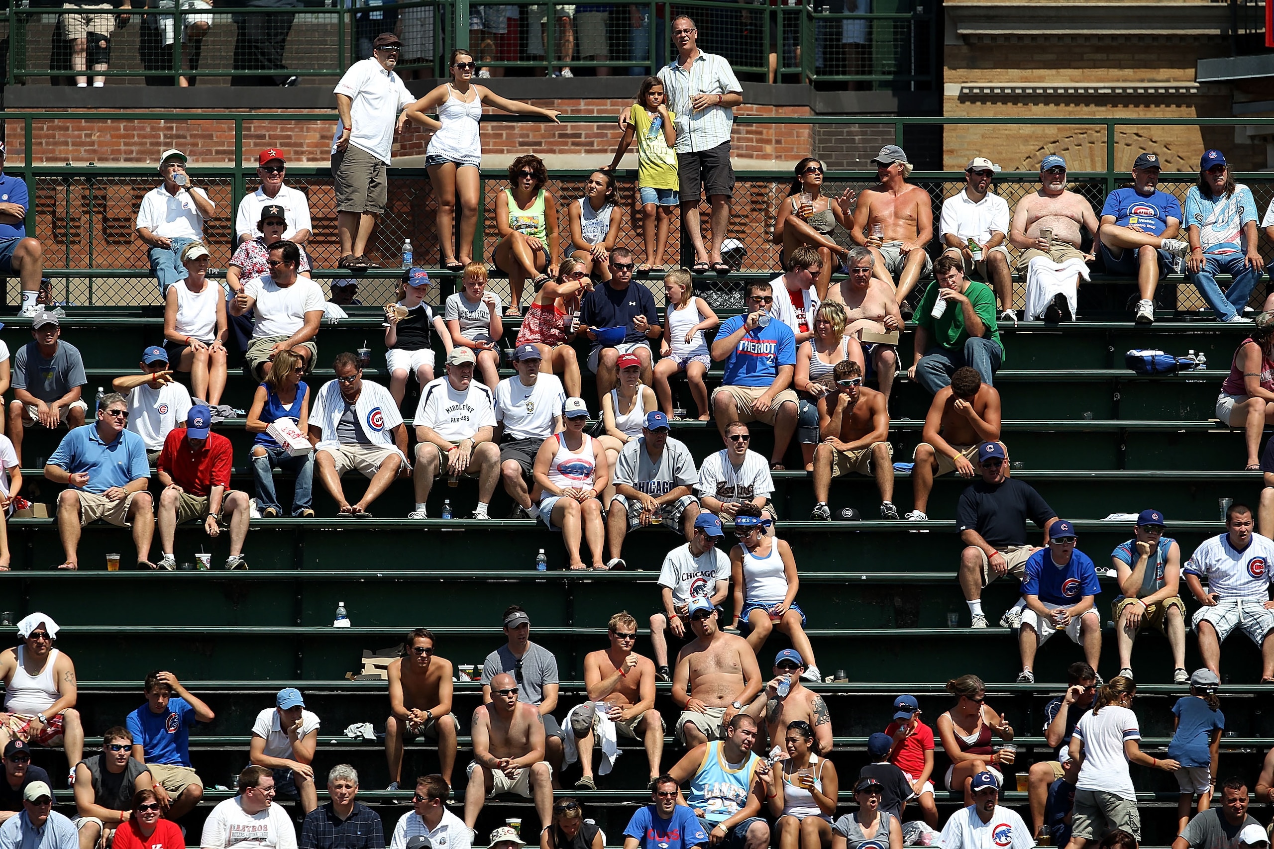 CHICAGO - JULY 21: Empty seats are seen in the bleachers during a game between the Chicago Cubs and the Houston Astros at Wrigley Field on July 21, 2010 in Chicago, Illinois. The Astros defeated the Cubs 4-3 in 12 innings. (Photo by Jonathan Daniel/Getty