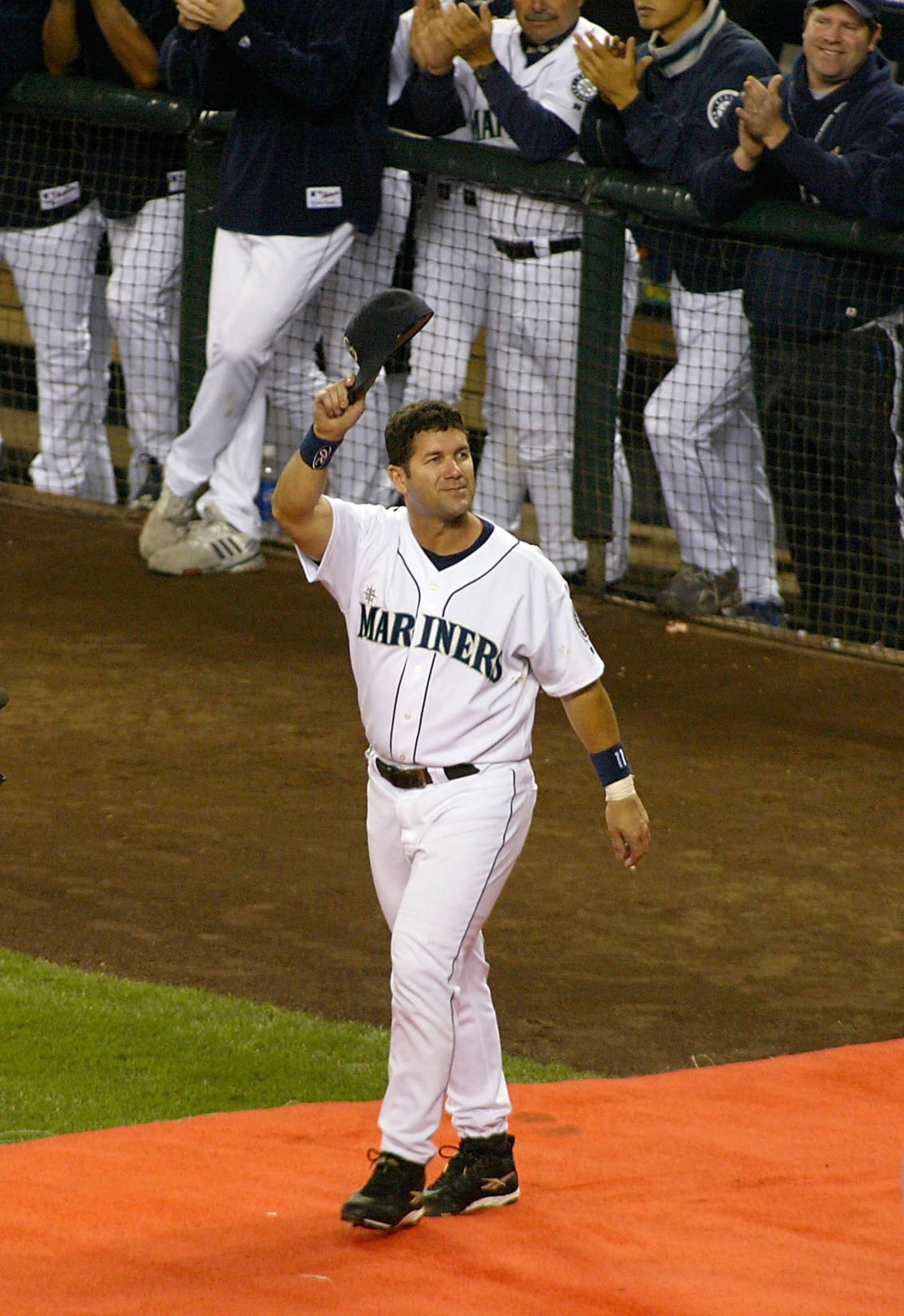 SEATTLE, WA - OCTOBER 2:  Edgar Martinez #11 of the Seattle Mariners walks onto the field during a post game ceremony honoring his 18 year career with the Mariners on October 2, 2004 at Safeco Field in Seattle, Washington.  (Photo by Lisa Blumenfeld/Getty
