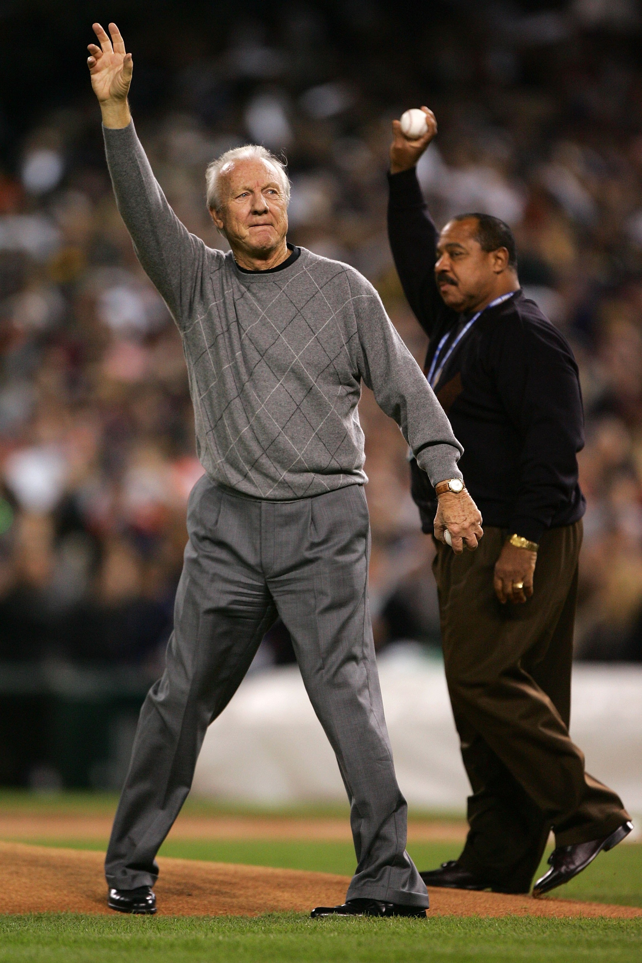 DETROIT - OCTOBER 21:  Former Tigers Al Kaline (L) and Willie Horton acknowledge the fans before throwing out the cerimonial first pitch prior to Game One of 2006 World Series between the Detroit Tigers and the St. Louis Cardinals October 21, 2006 at Come