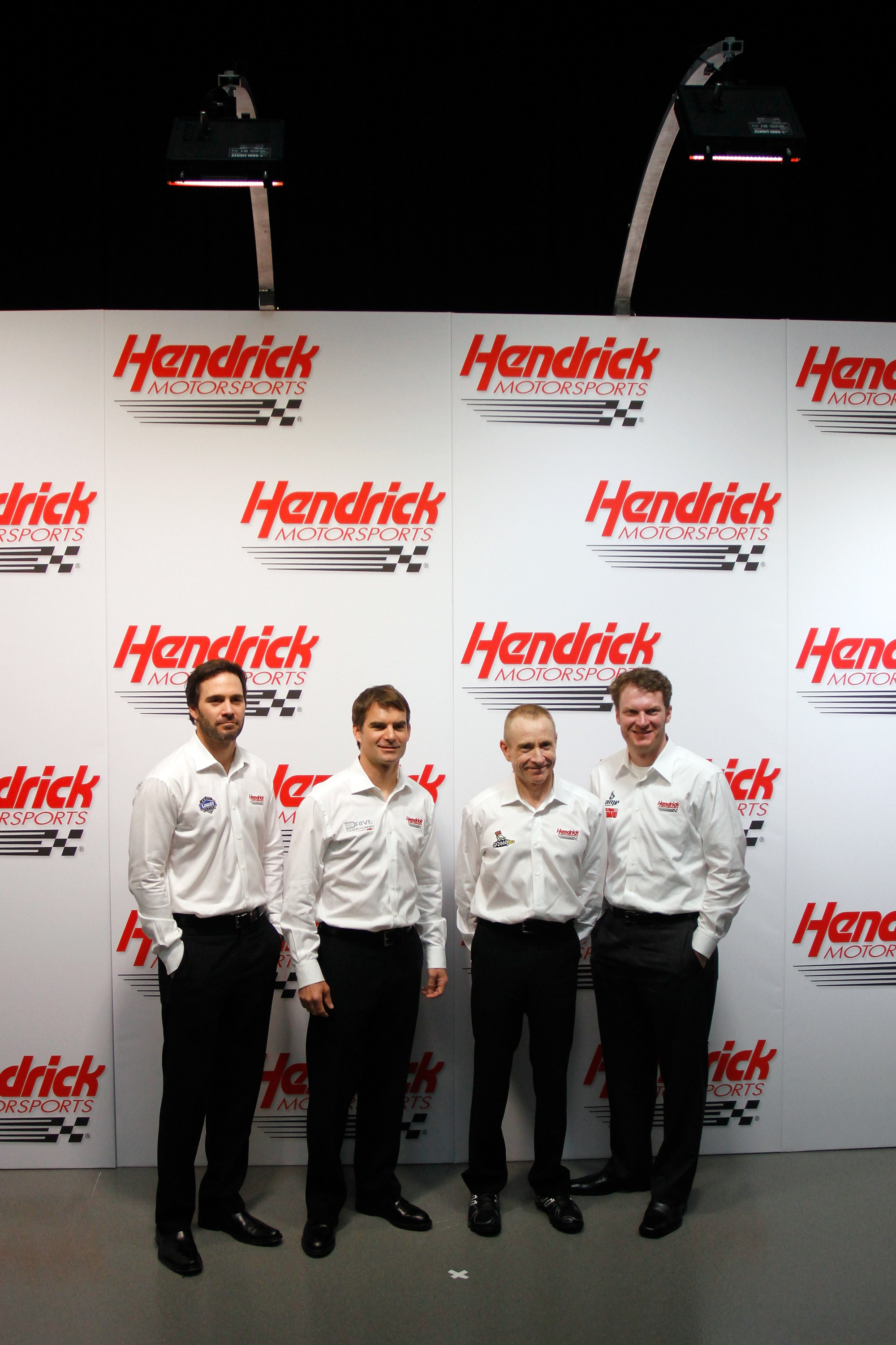 CONCORD, NC - JANUARY 26:  (L-R) Jimmie Johnson, driver of the #48 Lowe's Chevrolet, Jeff Gordon, driver of the #24 Drive to End Hunger Chevrolet, Mark Martin, driver of the #5 GoDaddy.com Chevrolet, and Dale Earnhardt Jr., driver of the #88 AMP Energy Ch