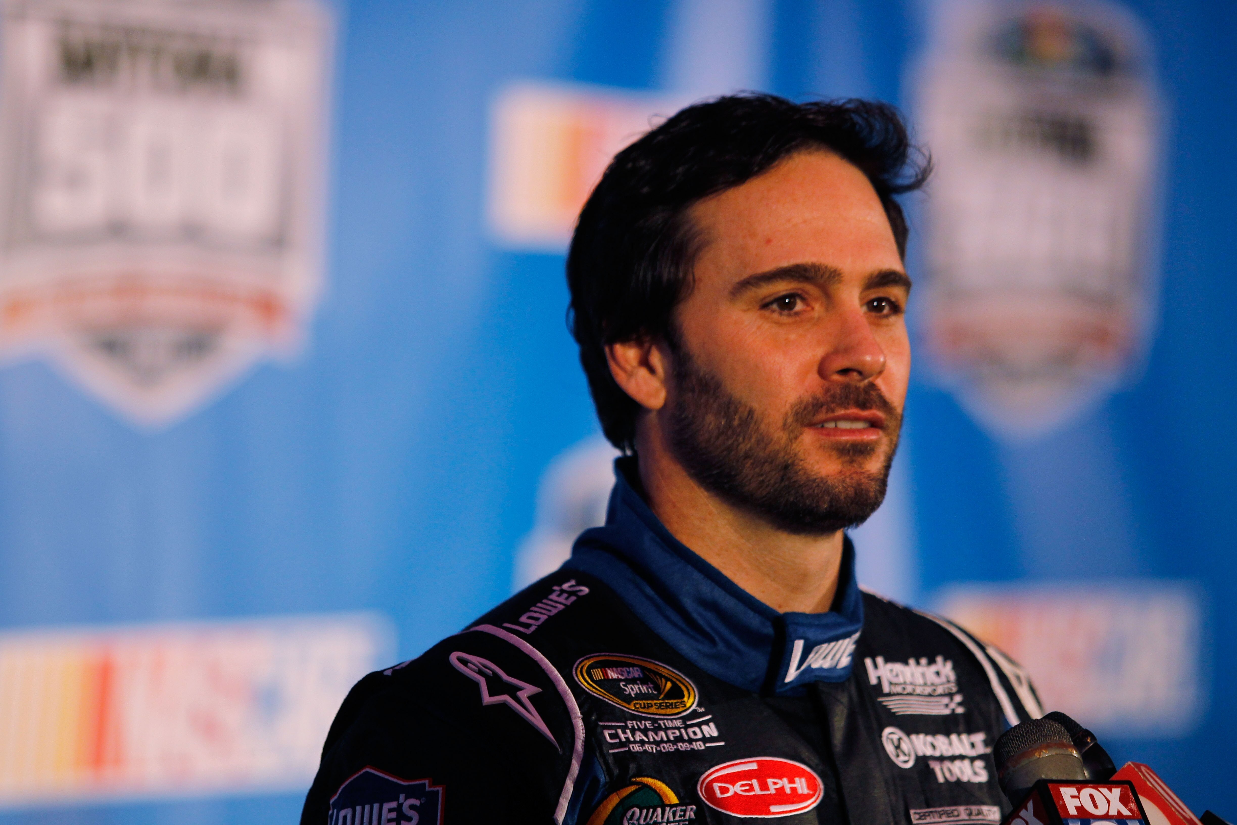 DAYTONA BEACH, FL - FEBRUARY 10:  Jimmie Johnson, driver of the #48 Lowe's Chevrolet, speaks to members of the media during the 2011 NASCAR Sprint Cup Series Media Day at Daytona International Speedway on February 10, 2011 in Daytona Beach, Florida.  (Pho