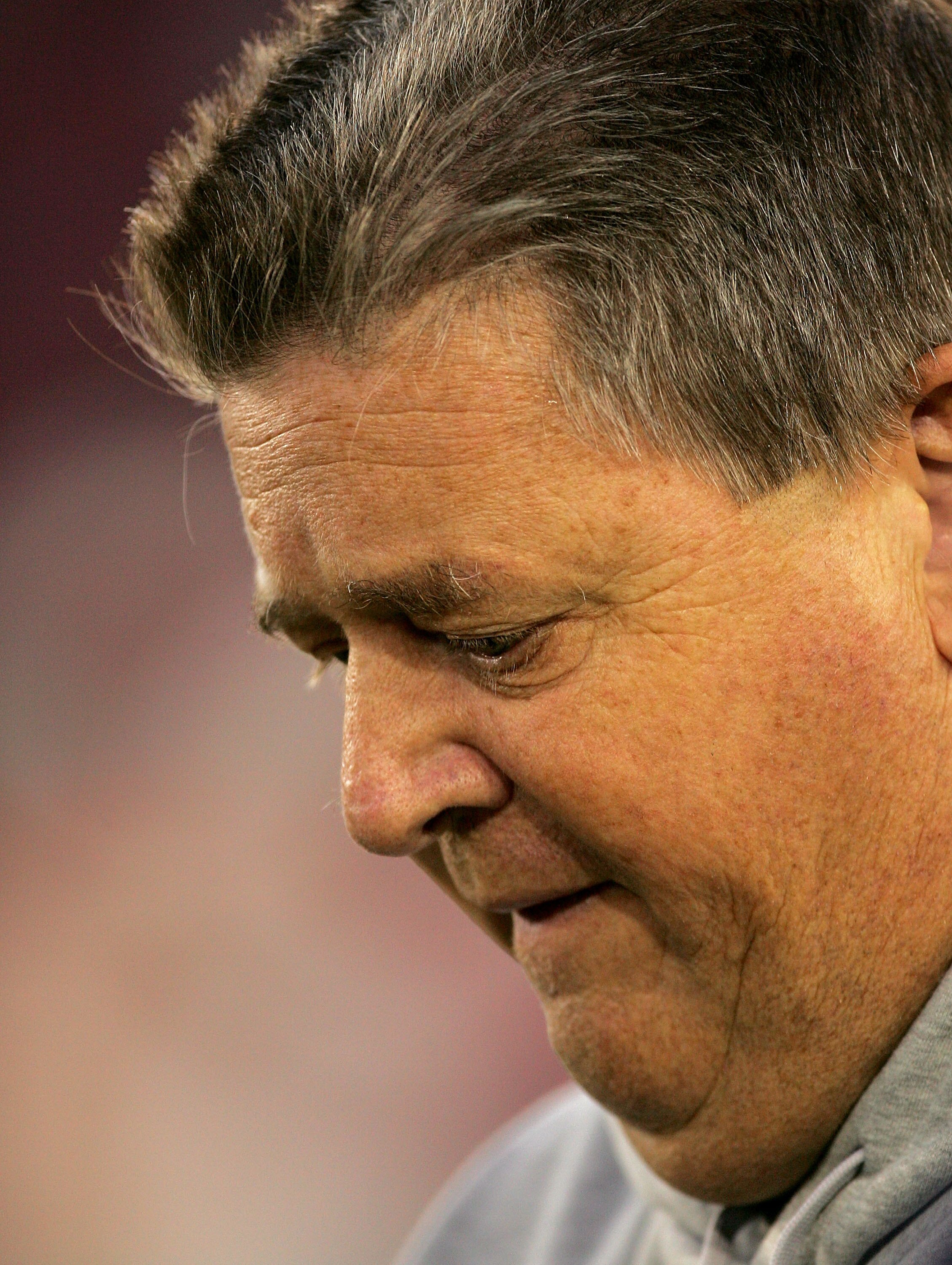 PALO ALTO, CA - NOVEMBER 28:  Notre Dame head coach Charlie Weis walks off the field after warmups for their game against the Stanford Cardinal at Stanford Stadium on November 28, 2009 in Palo Alto, California.  (Photo by Ezra Shaw/Getty Images)