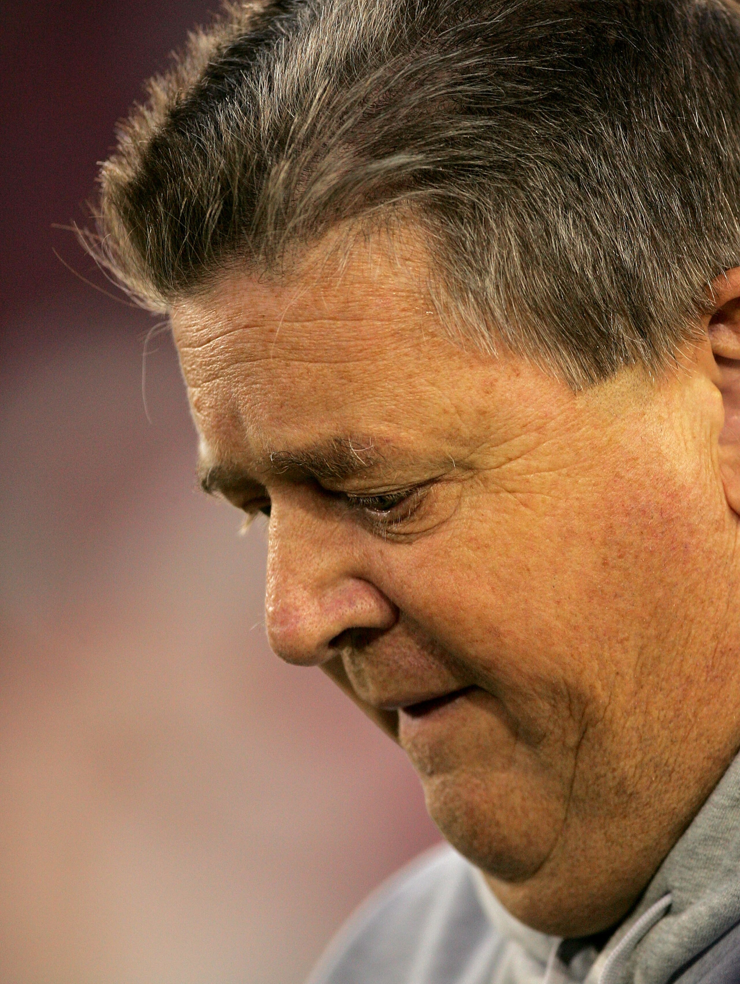 PALO ALTO, CA - NOVEMBER 28:  Notre Dame head coach Charlie Weis walks off the field after warmups for their game against the Stanford Cardinal at Stanford Stadium on November 28, 2009 in Palo Alto, California.  (Photo by Ezra Shaw/Getty Images)