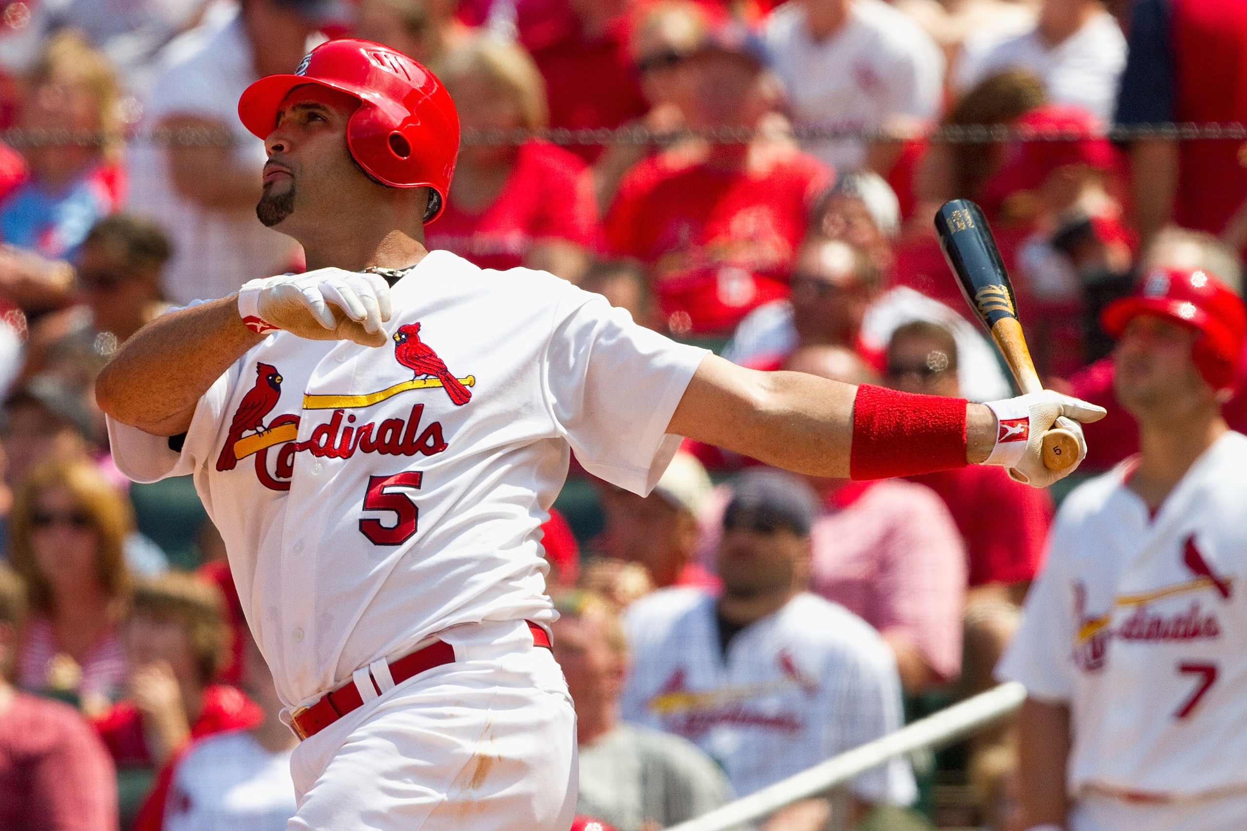 ST. LOUIS - AUGUST 1: Albert Pujols #5 of the St. Louis Cardinals hits a two-run home run against the Pittsburgh Pirates at Busch Stadium on August 1, 2010 in St. Louis, Missouri. The Cardinals beat the Pirates 9-1. (Photo by Dilip Vishwanat/Getty Image ST. LOUIS - AUGUST 1: Albert Pujols #5 of the St. Louis Cardinals hits a two-run home run against the Pittsburgh Pirates at Busch Stadium on August 1, 2010 in St. Louis, Missouri. The Cardinals beat the Pirates 9-1. (Photo by Dilip Vishwanat/Getty Image