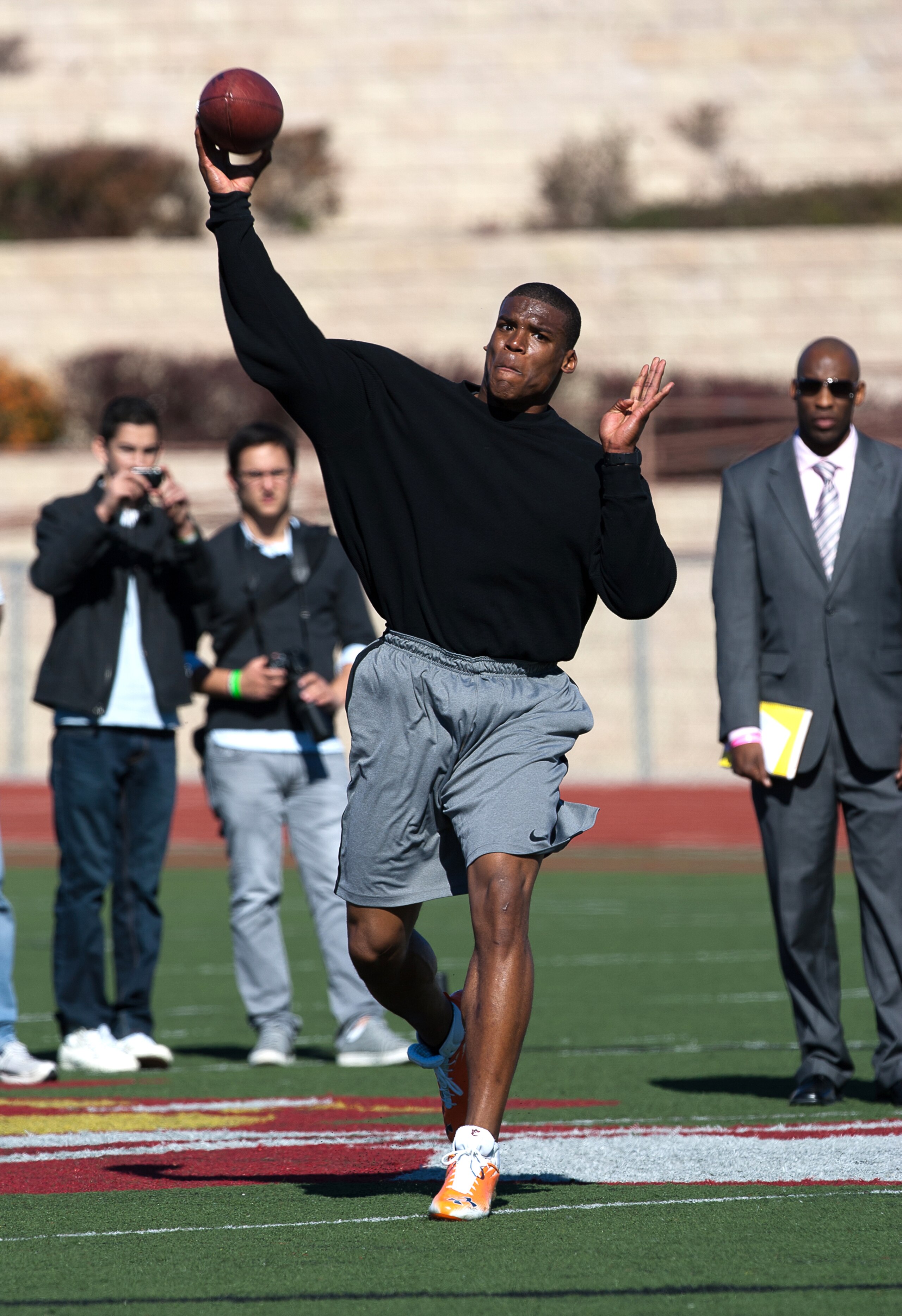 SAN DIEGO, CA - FEBRUARY 10: 2010 Heisman Trophy winning quarterback Cam Newton of Auburn throws the ball during his workout routine for the media at Cathedral High School's sports stadium on February 10, 2011 in San Diego, California. (Photo by Kent Horn SAN DIEGO, CA - FEBRUARY 10: 2010 Heisman Trophy winning quarterback Cam Newton of Auburn throws the ball during his workout routine for the media at Cathedral High School's sports stadium on February 10, 2011 in San Diego, California. (Photo by Kent Horn