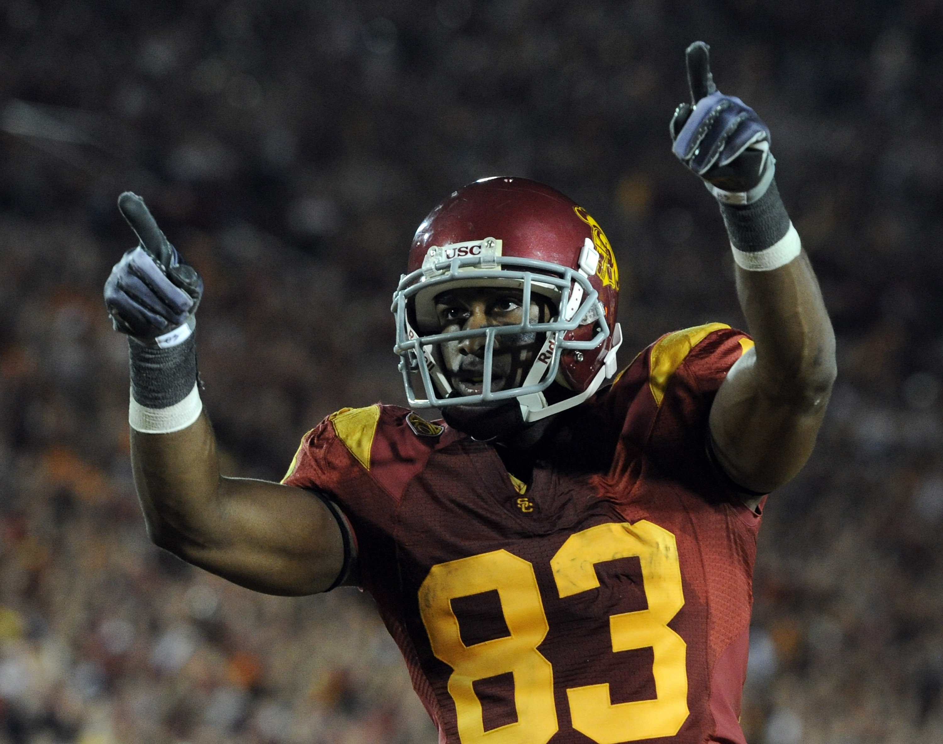LOS ANGELES, CA - OCTOBER 30: Ronald Johnson #83 of the USC Trojans celebrates his two point conversion for a 32-29 lead over the Oregon Ducks during the third quarter at Los Angeles Memorial Coliseum on October 30, 2010 in Los Angeles, California.  (Phot