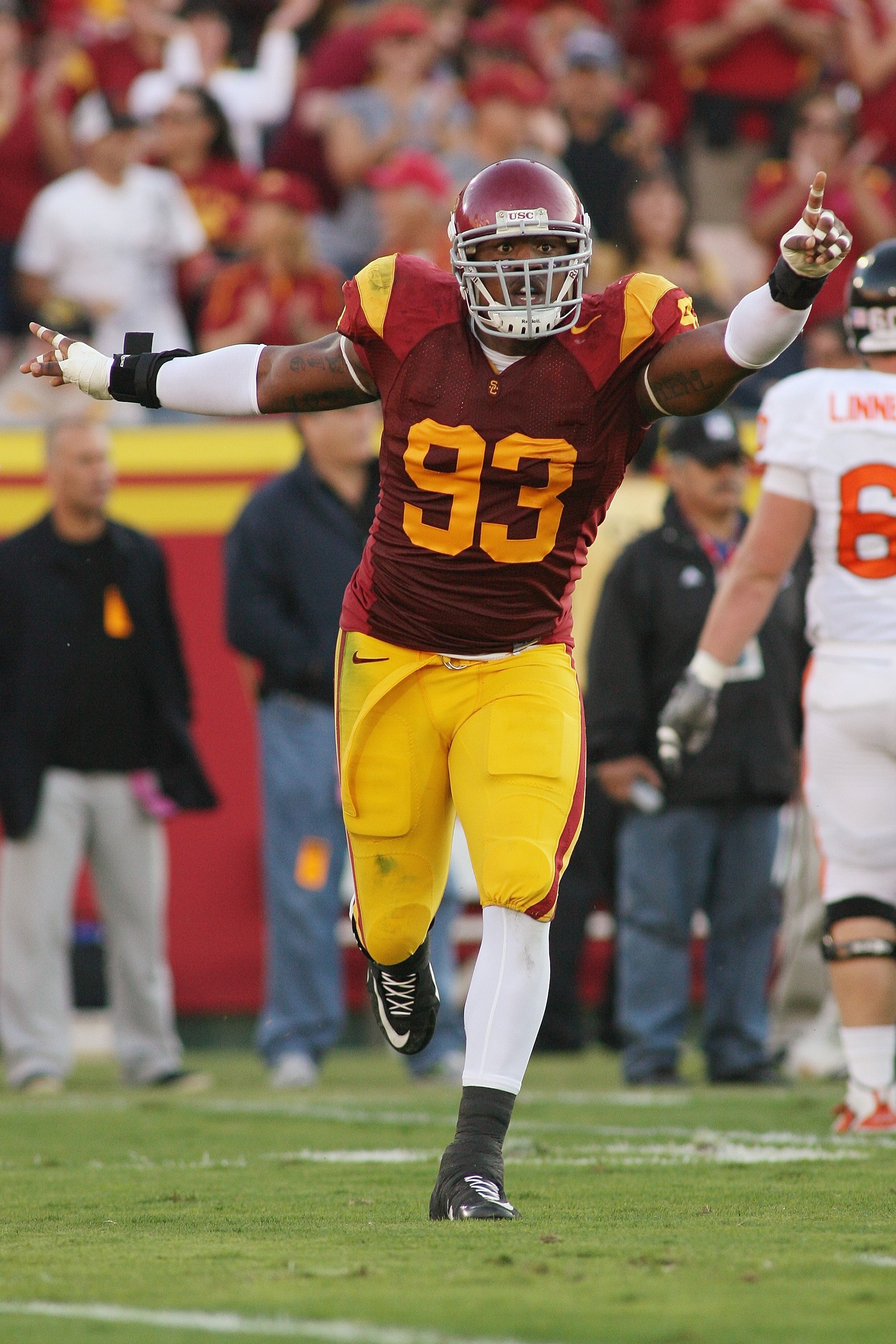 LOS ANGELES, CA - OCTOBER 24:  Everson Griffen #93 of the USC Trojans celebrates a fumble recovery against the Oregon State Beavers on October 24, 2009 at the Los Angeles Coliseum in Los Angeles, California.  USC won 42-36.  (Photo by Jeff Golden/Getty Im