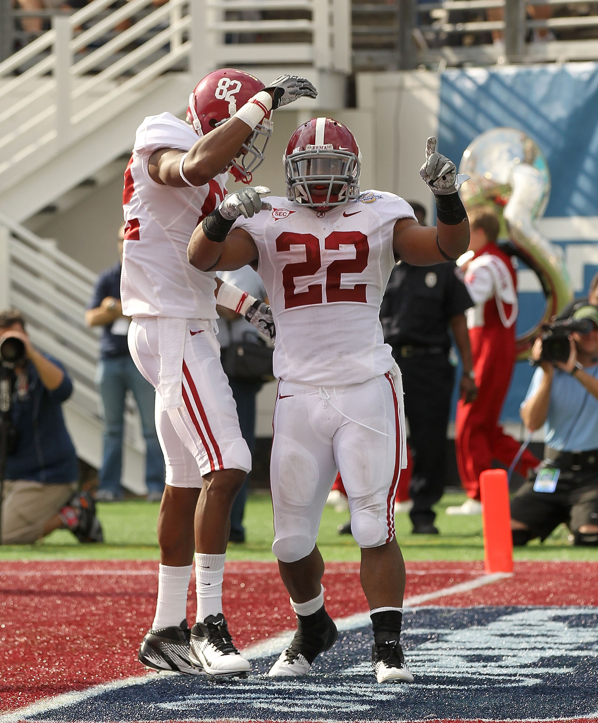 ORLANDO, FL - JANUARY 01:  Mark Ingram #22 of the Alabama Crimson Tide celebrates after rushing for a touchdown during the Capitol One Bowl against the Michigan State Spartans at the Florida Citrus Bowl on January 1, 2011 in Orlando, Florida.  (Photo by M