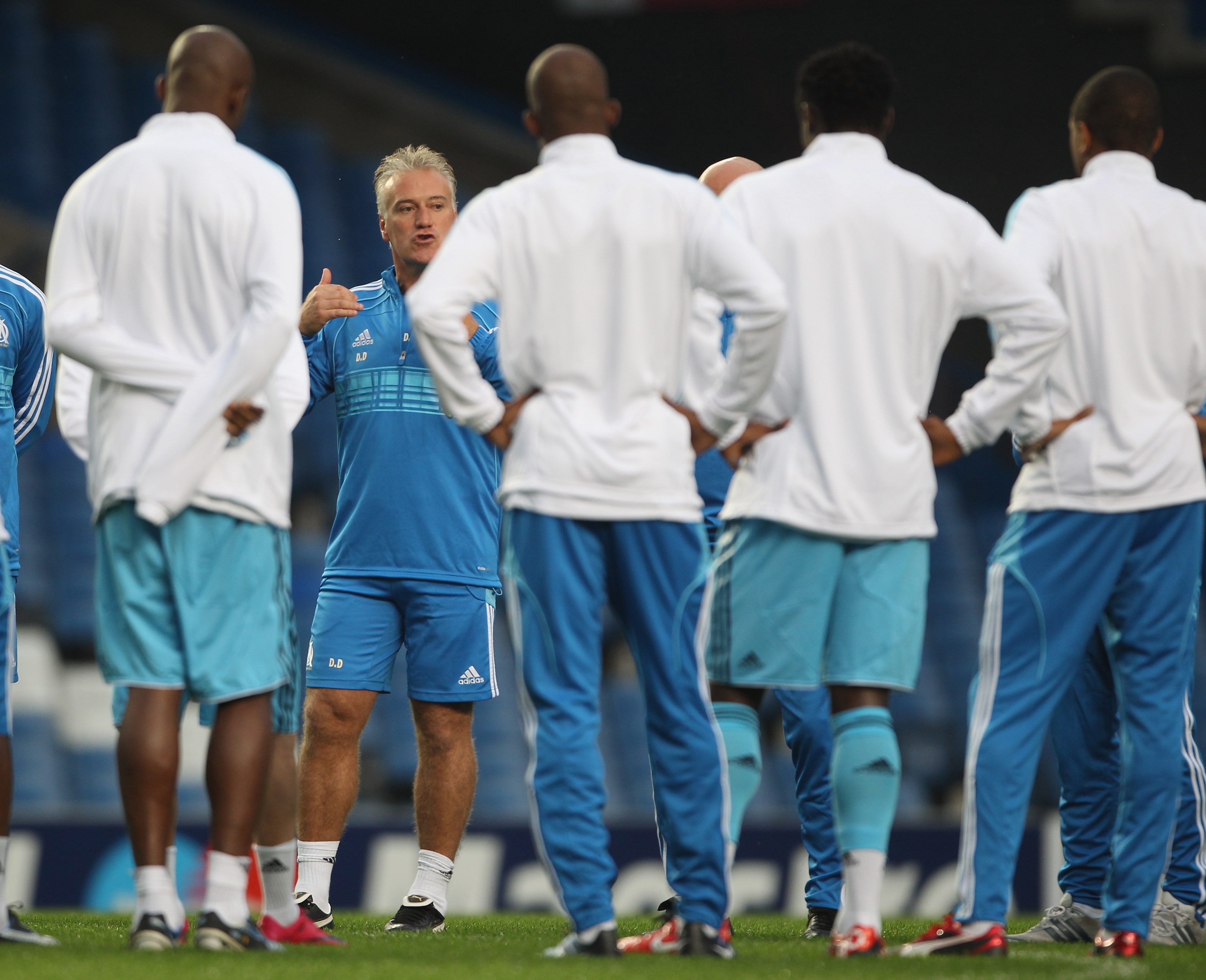 LONDON, ENGLAND - SEPTEMBER 27:  Marseille coach Didier Deschamps gives instructions to his players during a training session ahead of their UEFA Champions League Group F match against Chelsea FC at Stamford Bridge on September 27, 2010 in London, England