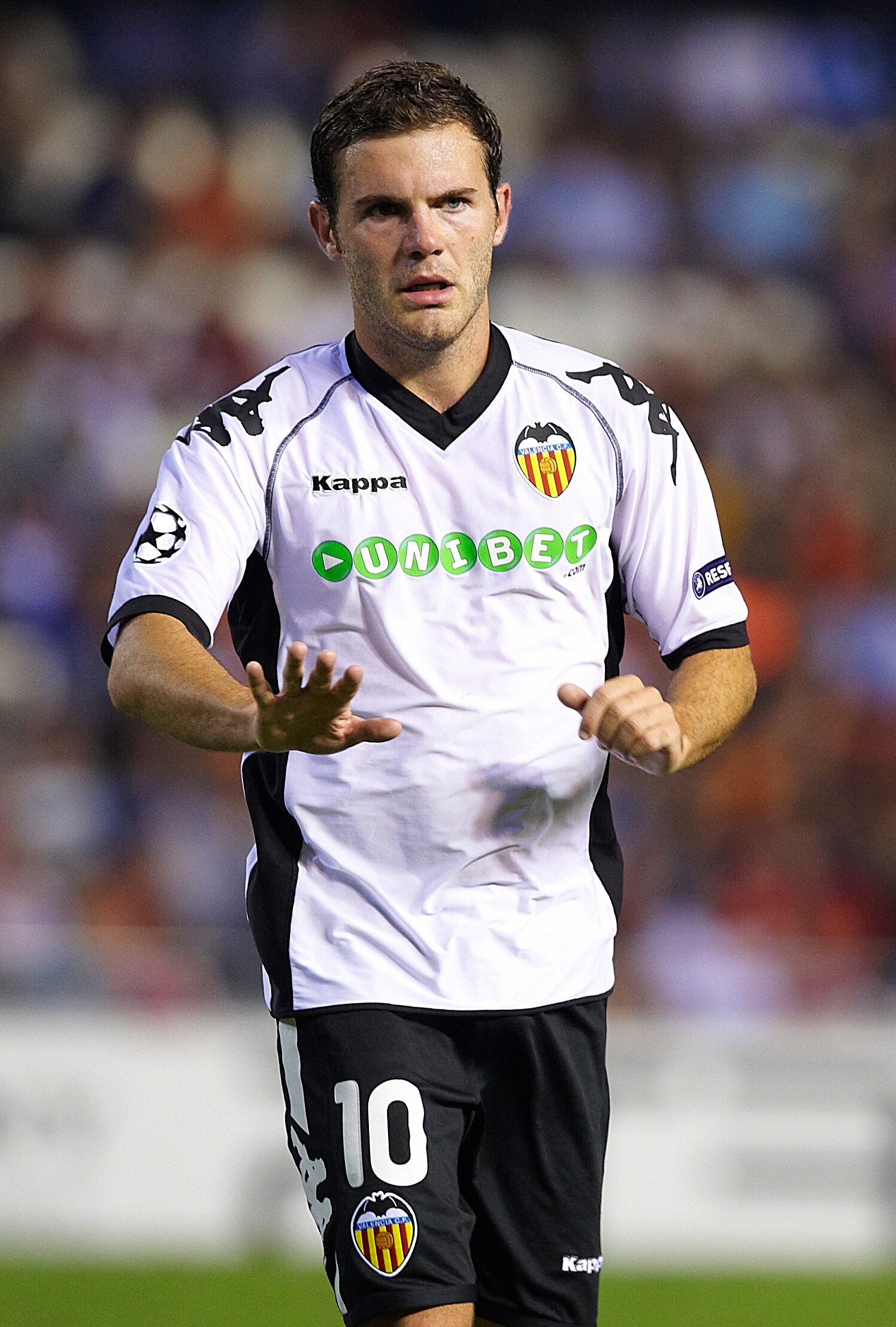 VALENCIA, SPAIN - SEPTEMBER 29:  Juan Mata of Valencia reacts during the UEFA Champions League group C match between Valencia and Manchester United on September 29, 2010 in Valencia, Spain. Manchester United won 1-0.  (Photo by Manuel Queimadelos Alonso/G