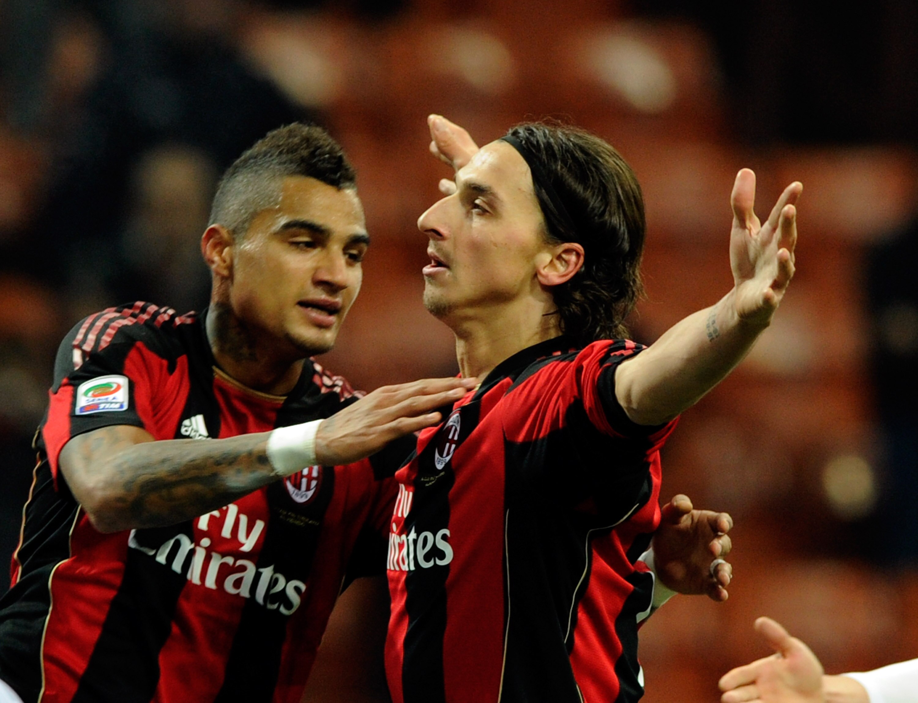 MILAN, ITALY - DECEMBER 04:  Zlatan Ibrahimovic and Kevin Prince Boateng of AC Milan celebrate scoring the third goal during the Serie A match between Milan and Brescia at Stadio Giuseppe Meazza on December 4, 2010 in Milan, Italy.  (Photo by Claudio Vill